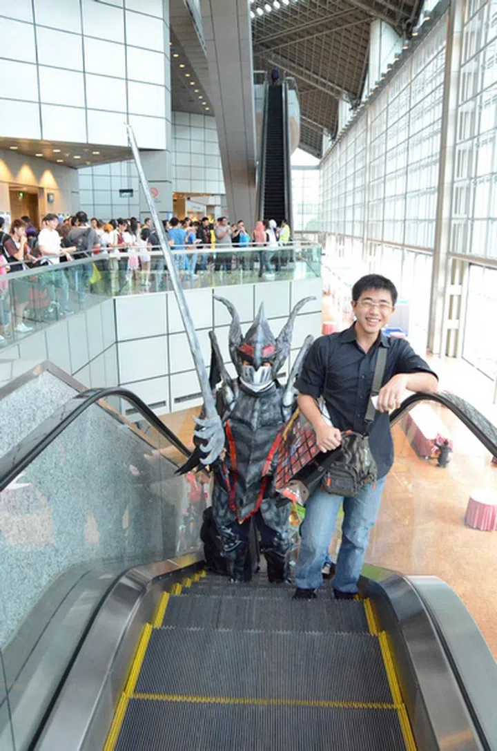 Not everyday you have a big...whatever he is...going up the escalators in Suntec City.