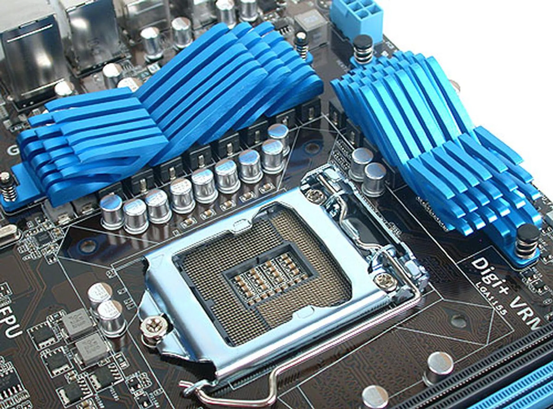 While the passive heatsinks near the CPU socket are low enough, we found that the mounting hole at the top right corner in this image is a bit too close to the heatsinks. It makes it slightly harder to remove the CPU cooler.