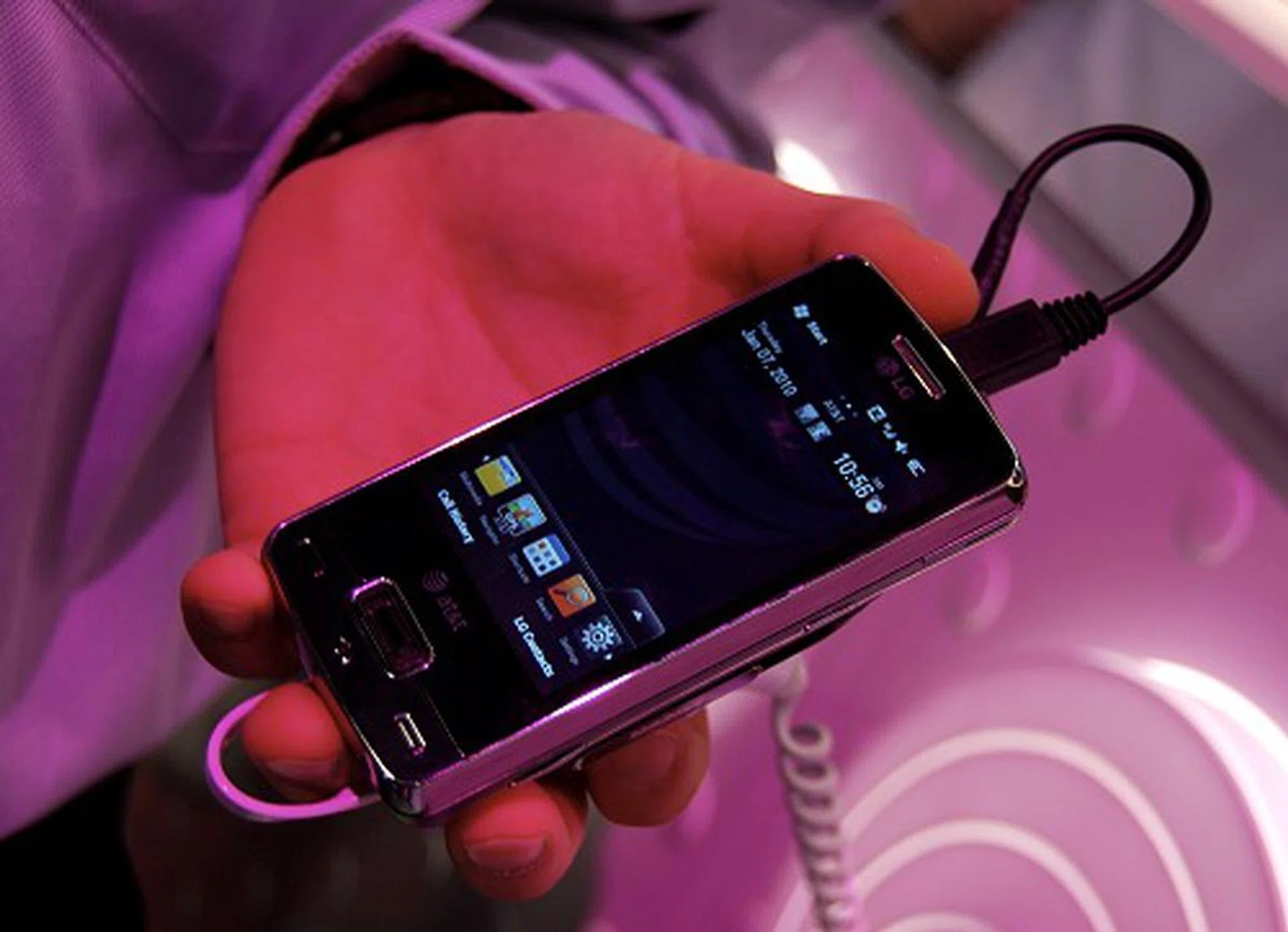 The LG eXpo or otherwise also known as the GW820 is powered by a 1GHz Qualcomm Snapdragon processor and supports a Pico projector, albeit not in the same way Nikon's projector camera does it. Other specs of the phone include a 3.2-inch WVGA touchscreen, 5MP camera, QWERTY keyboard, Bluetooth, WiFi, Biometric key and is available in both CDMA and GSM versions.