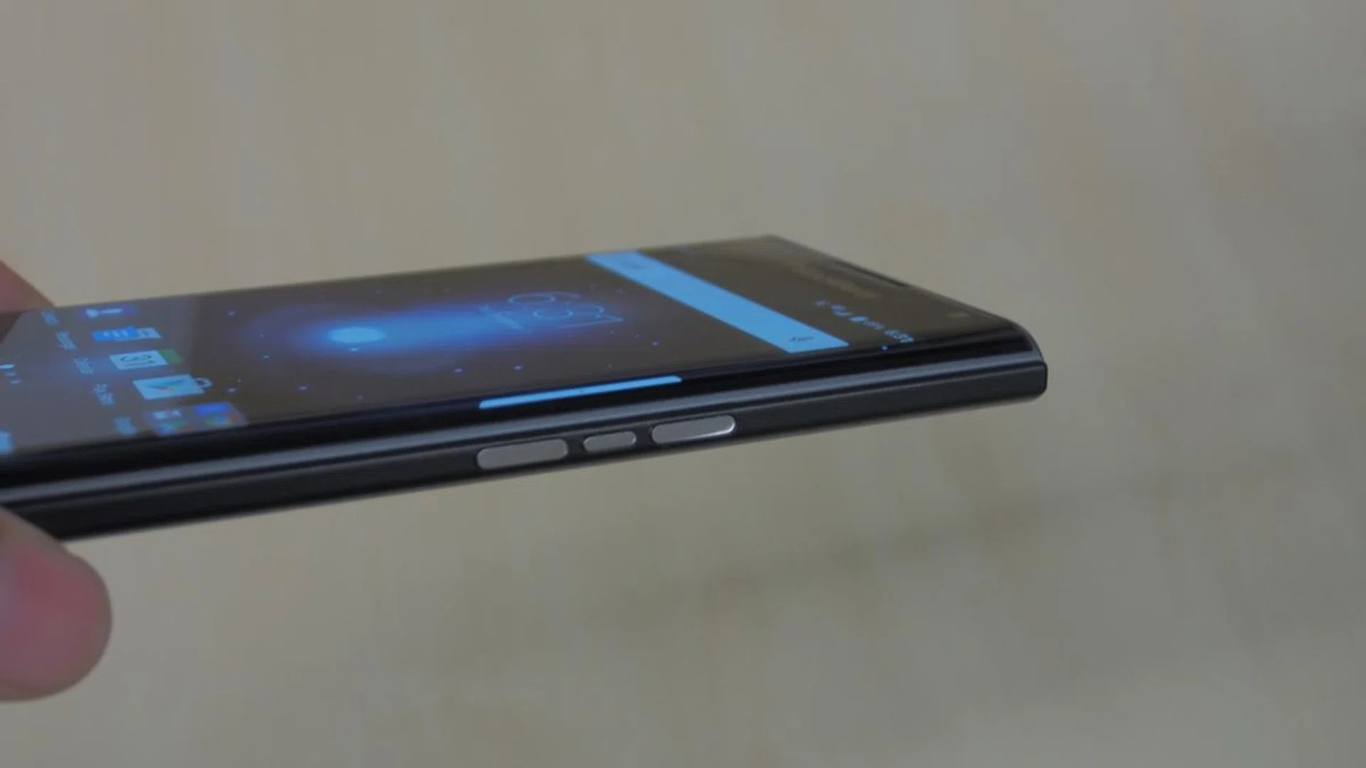 Curved screen, with the volume rockers and the silence button.