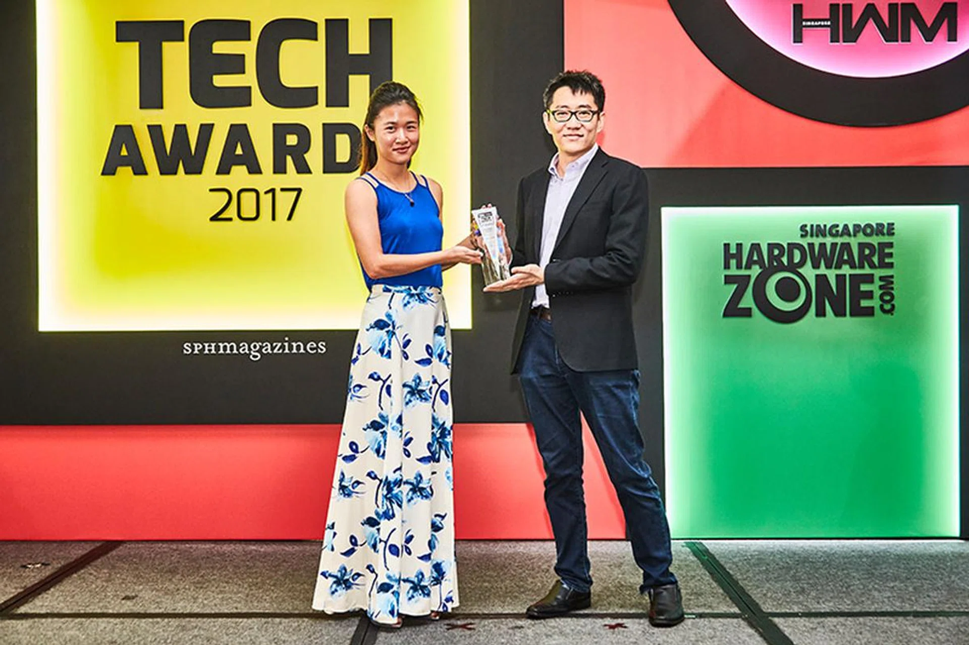 With an all-screen, speaker-less, and ceramic design, the Xiaomi Mi Mix is a technical marvel, which is why it's a winner of our Innovation Award. Accepting the award here is Ms. Ten Zhi-Lei from Xiaomi Singapore.