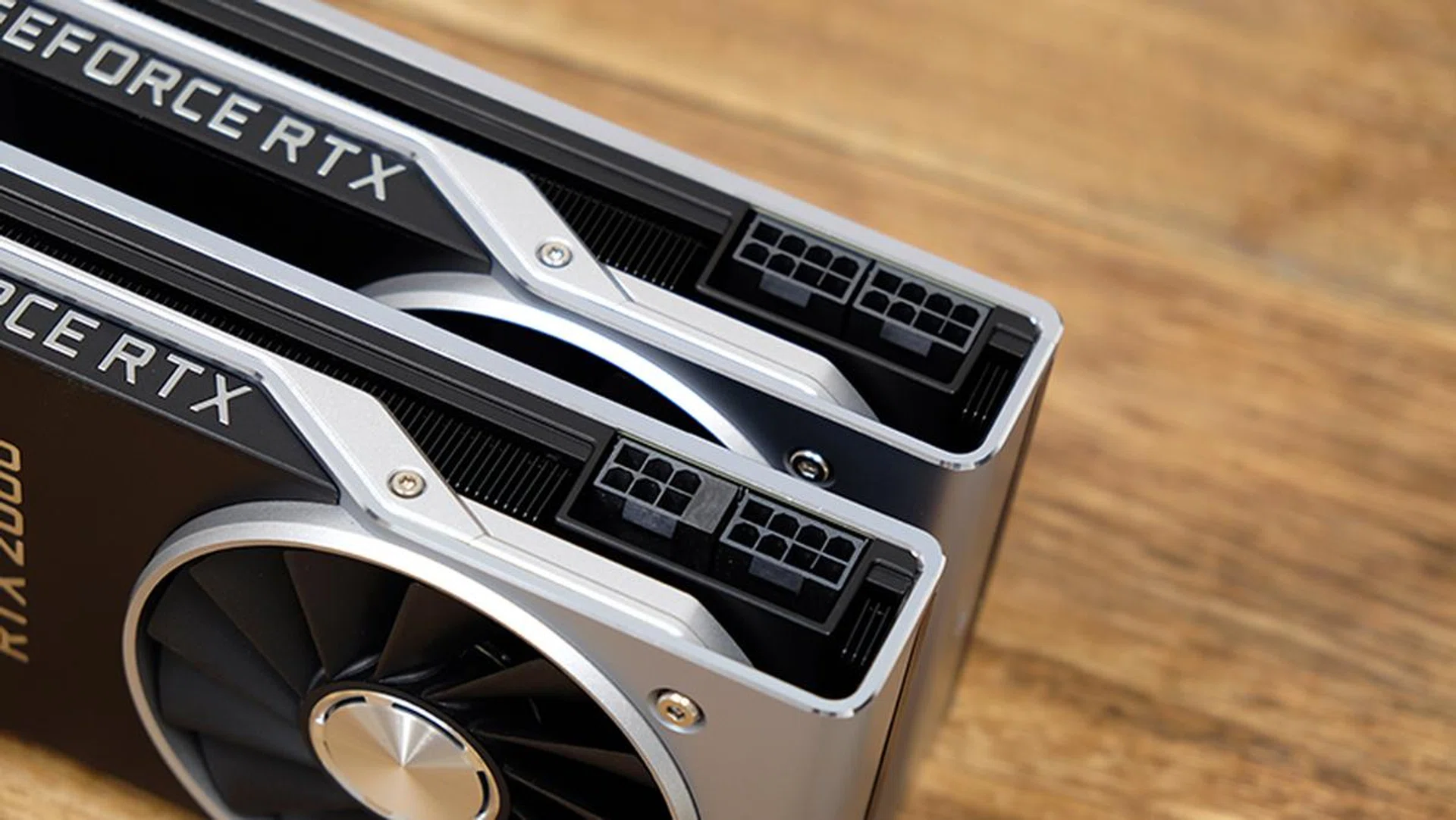 The GeForce RTX 2080 Ti requires two 8-pin PCIe connectors,whereas the GeForce RTX 2080 makes do with one 6-pin and one 8-pin connector.