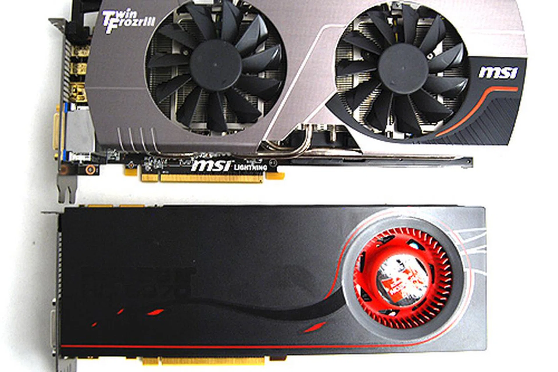 The MSI R6970 Lightning looks considerably stockier thanks to the large Twin Frozr III cooler.