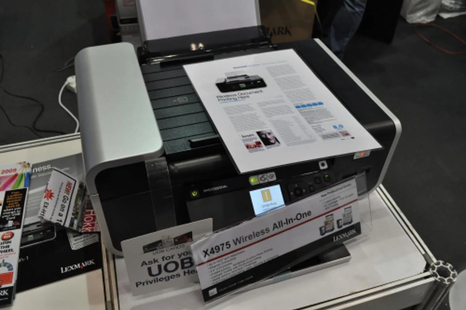 The X4975 is a professional all-in-one for office environments as it is priced at $299 and offers up to 30/27 ppm black/color with 4800 x 2400 dpi. Other features include 2 sided printing and Ethernet connectivity. There is even a 2.4-inch LCD screen for photo previews. Free gift is a bar fridge. 
