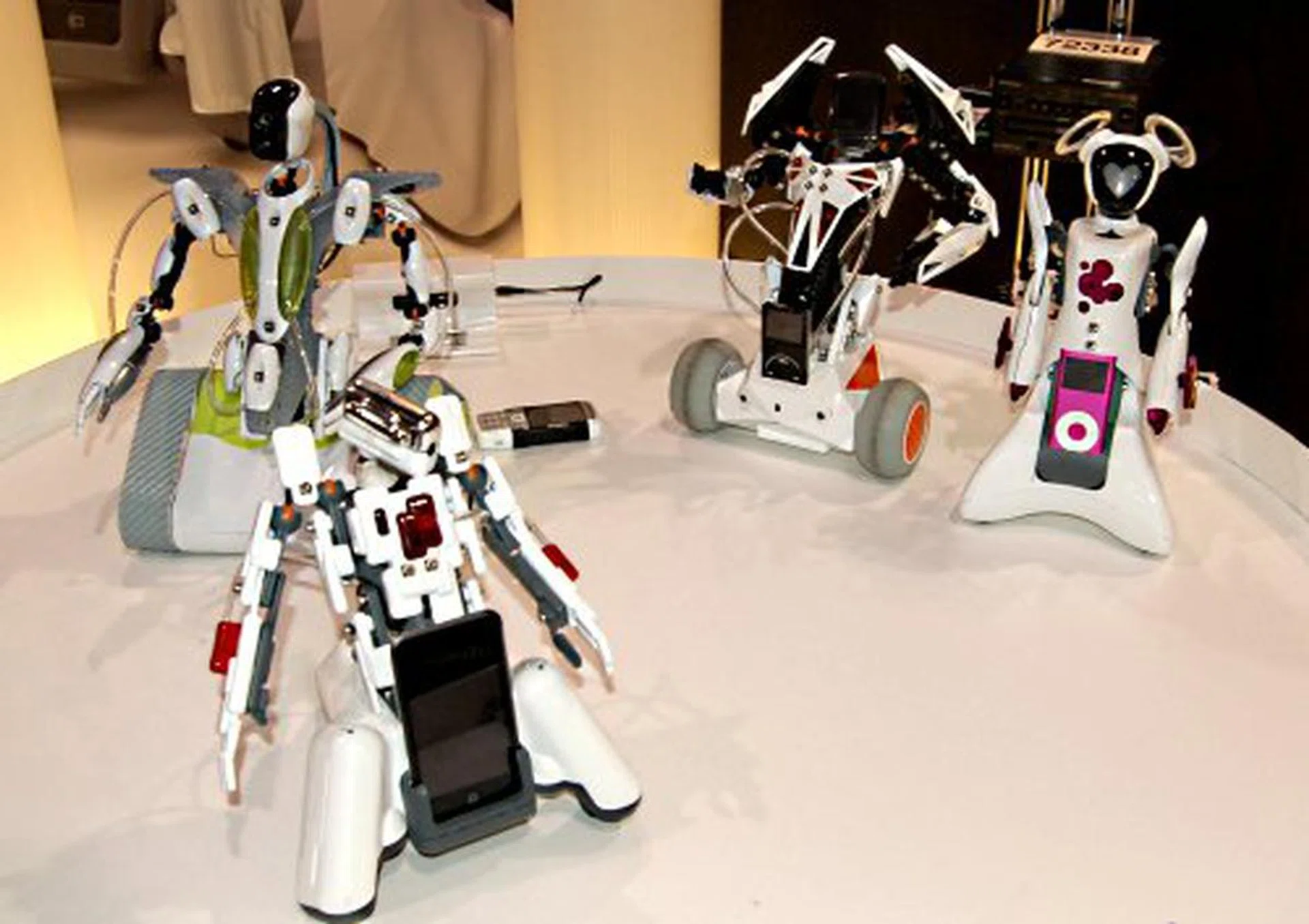 And while we're on robots. Erector's Spykee gets new friends with the Spykee Cell, Vox and Miss. Spykee Cell can be controlled from a mobile phone via Bluetooth, features a motorized head to take images and works as a Bluetooth speaker phone, which is also compatible with the iPod. Spykee Vox and Miss on the other hand are both voice activated and can supposedly express a limited set of emotions. They can also be programmed as a universal remote to activate devices via infrared. Vox for the boys and Miss for the girls.  