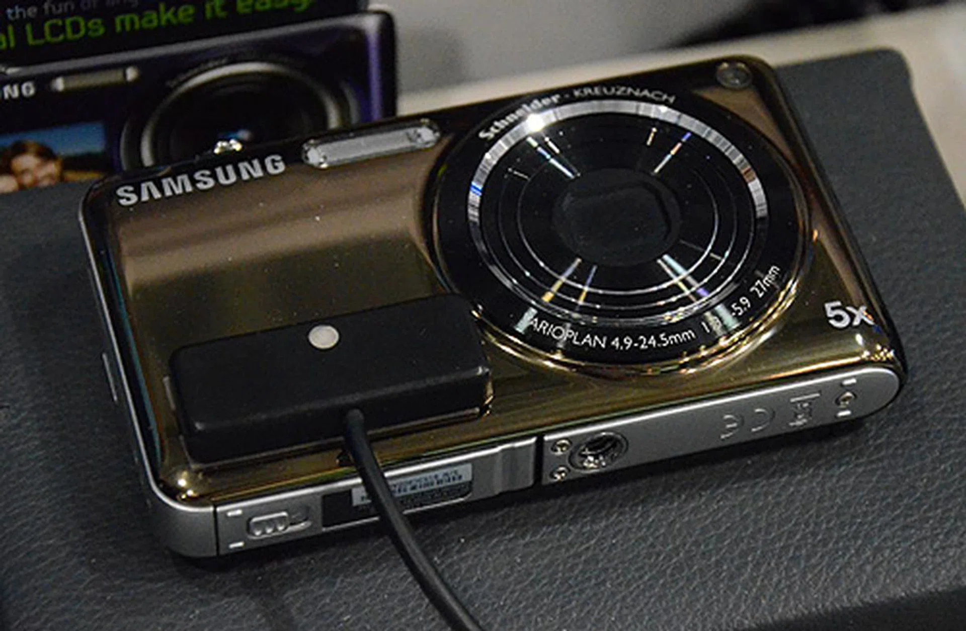 The Samsung ST600 is an interesting camera with dual LCDs for easy self-portraits. Going for only $399 and comes with a 8GB SD card, tripod, cleaning kit and additional batteries.