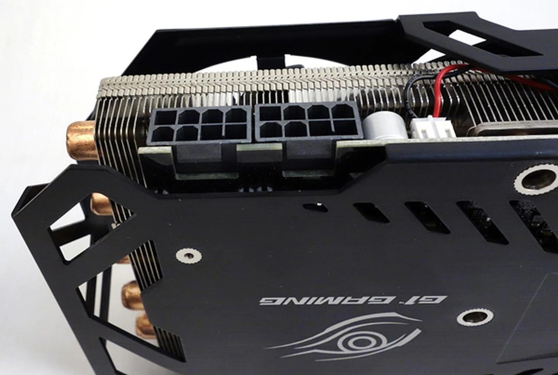 The two 8-pin Molex power connectors are positioned such that it's easier to insert the power plugs without the heatsink getting in their way. Also note that the dual 8-pin power connectors helps give the card more power when required.
