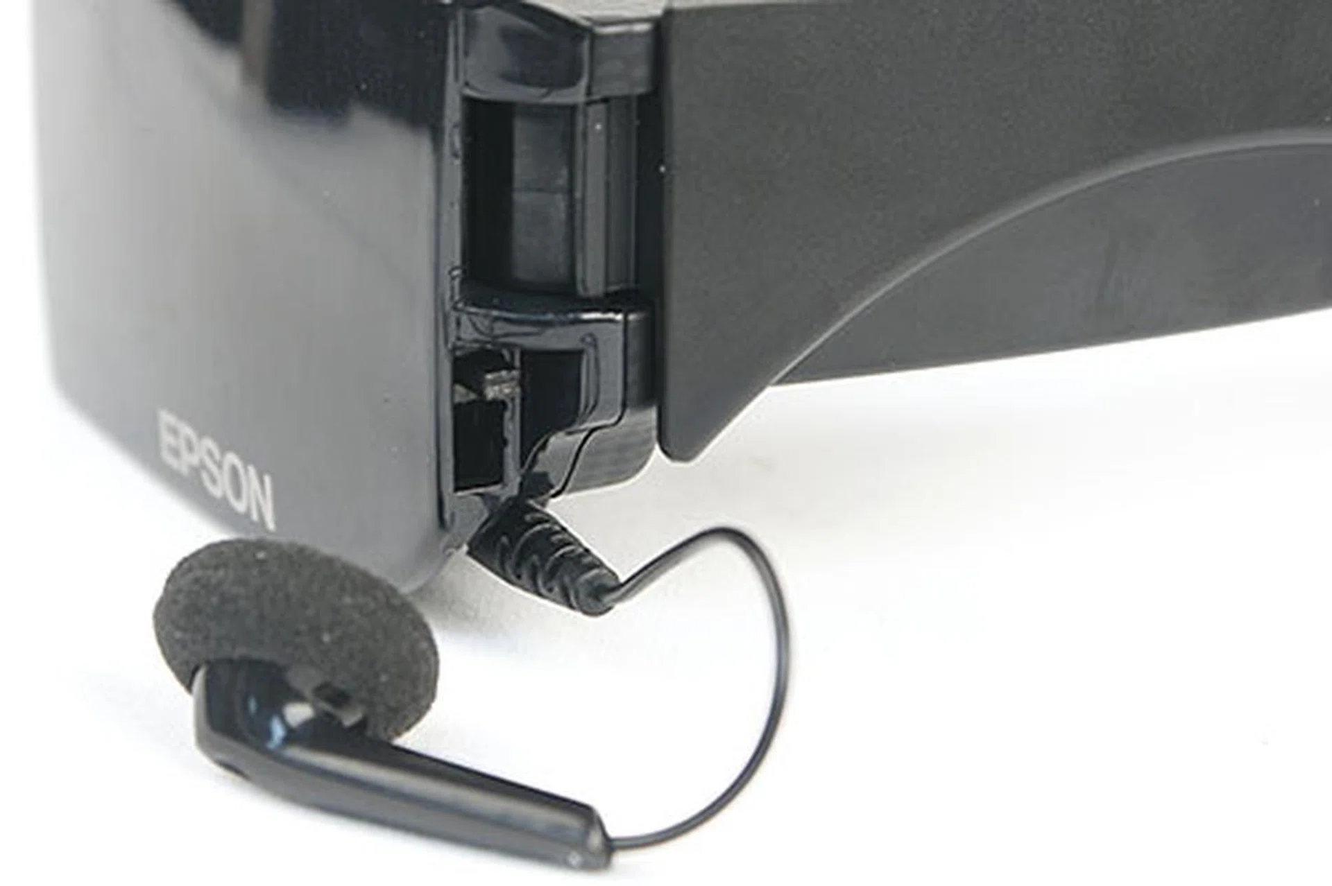 There are jacks near the hinges of the arms for plugging in the two mono earphones. If you prefer to use your own, the controller has a stereo mini-jack.