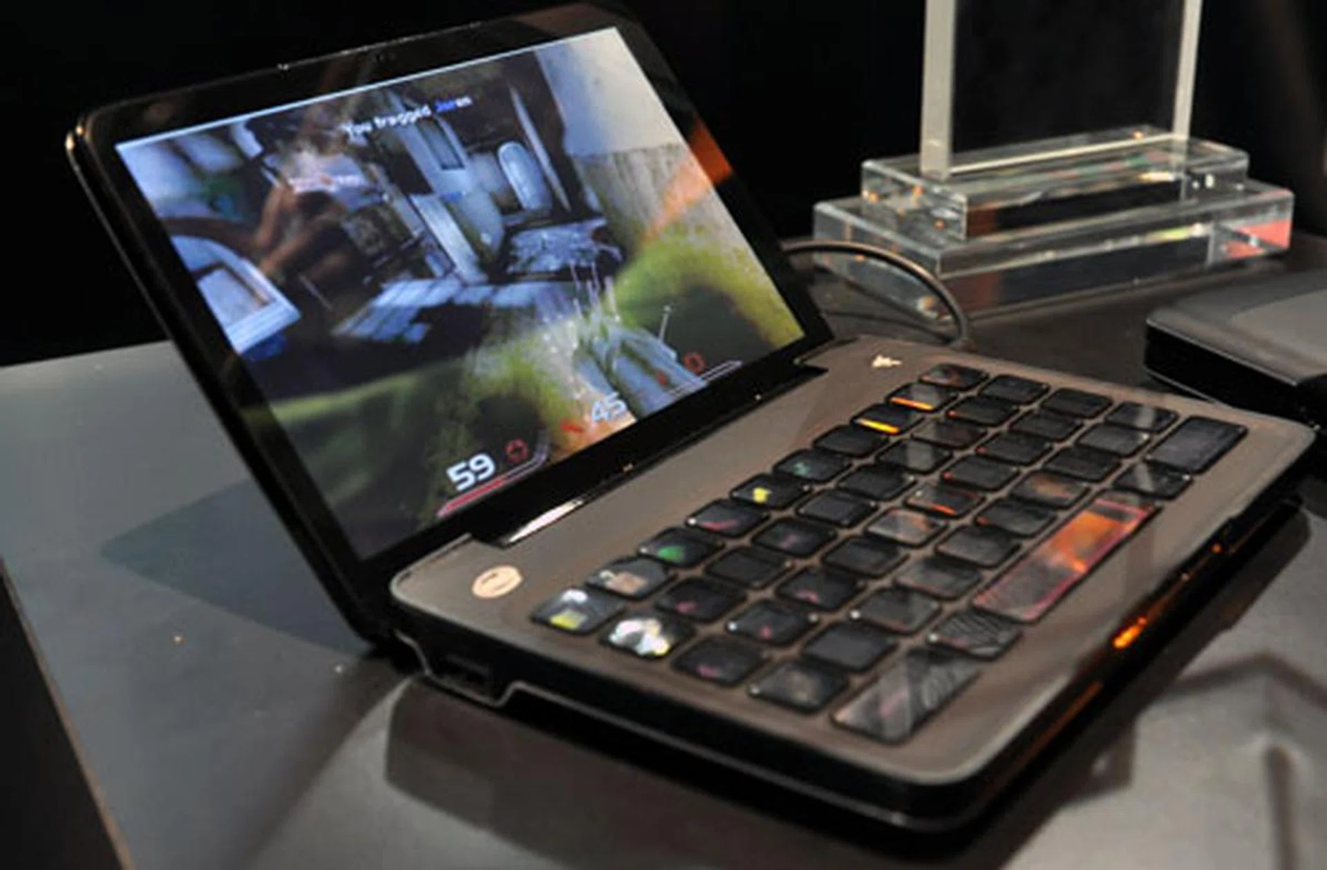 The highlight of Razer's show is the Razer Switchblade, a mini notebook powered by the Intel Atom processor that let's you play games with a keyboard that switches to a different layout depending on the game you play.