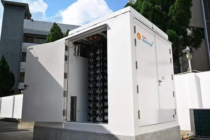 Each station has a big lithium-ion storage battery to safely hold electricity generated by solar panels.  (Image source: The Straits Times)
