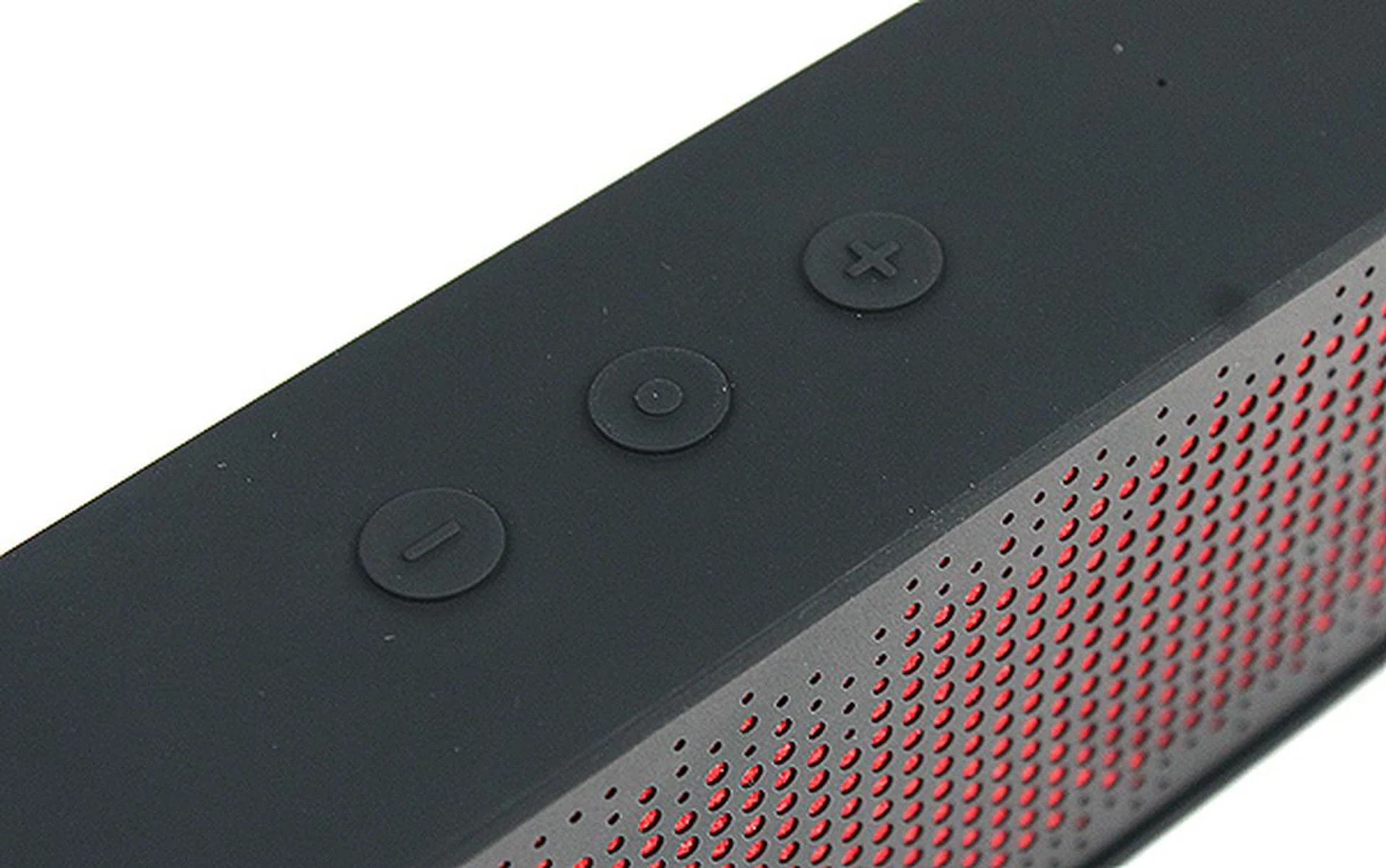 Press and hold onto the middle button until the LED indicator flashes white constantly. The middle button also acts as a "Talk" button. Press it to accept calls. The two buttons on its sides are for volume control.