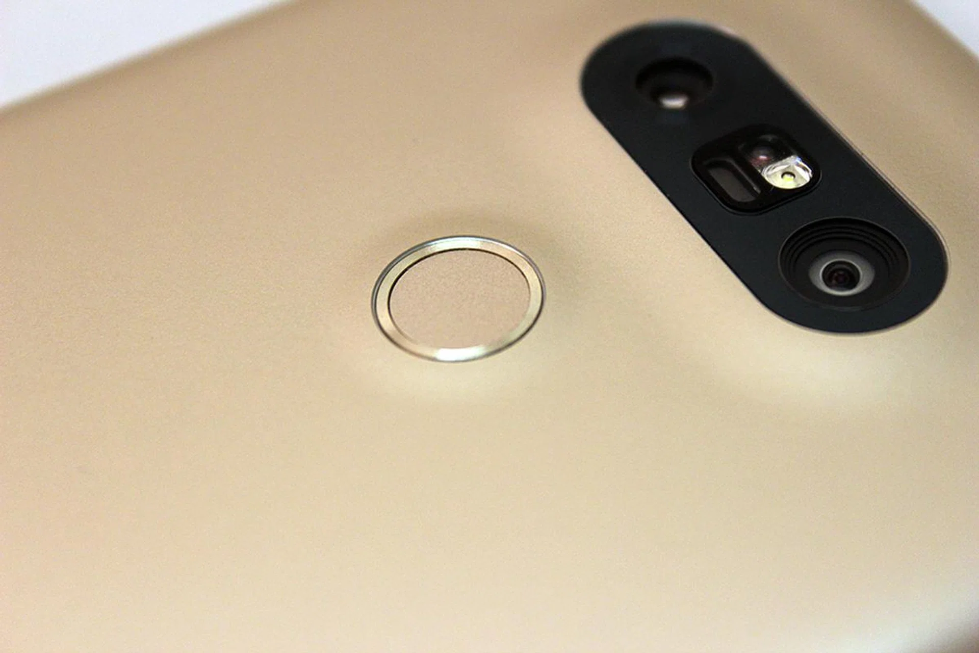 Fingerprint scanner on the back. Volume buttons have shifted, and what's going on with those humps?