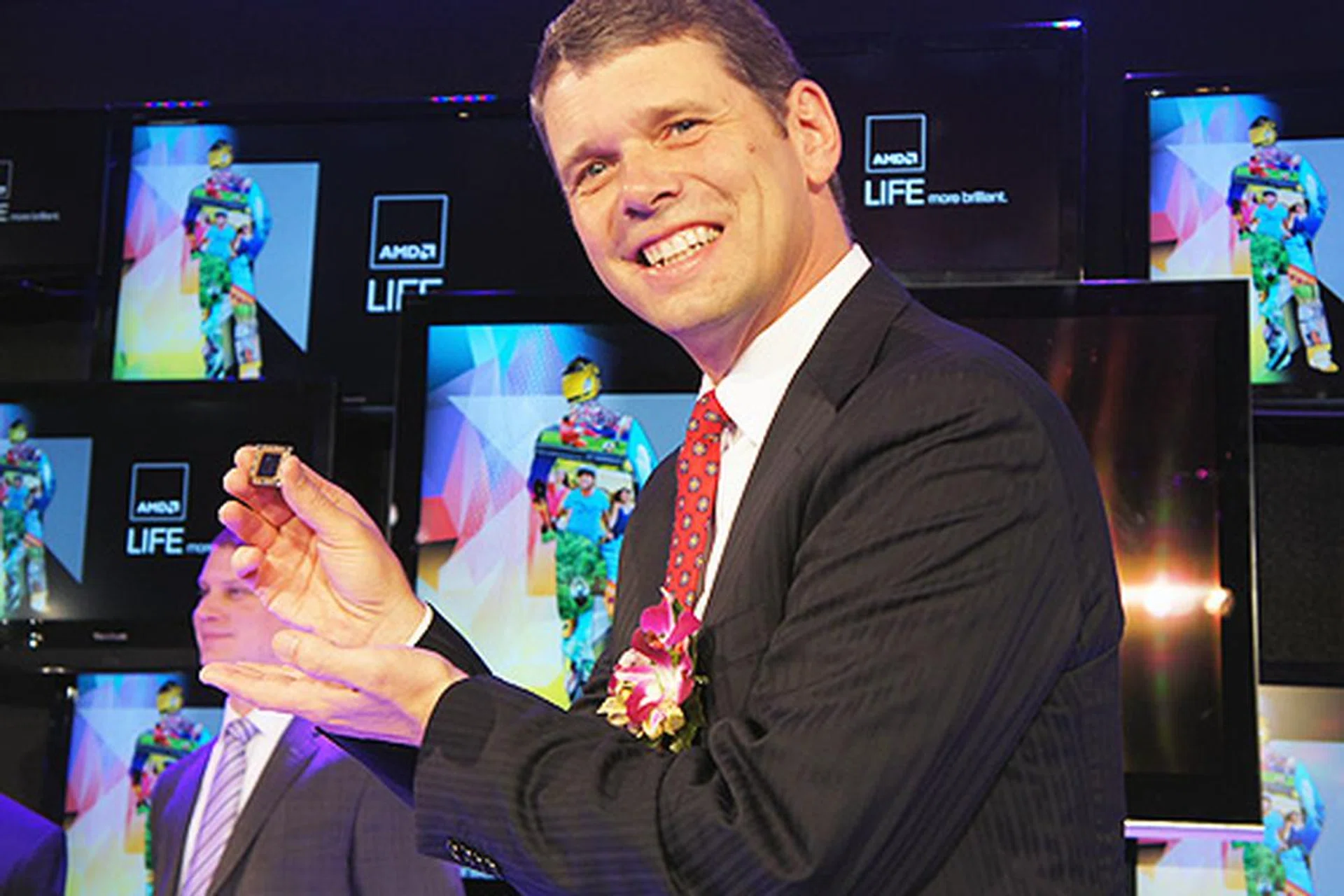 Rory Read, President and CEO of AMD, posing with the new Brazos 2.0 APU.