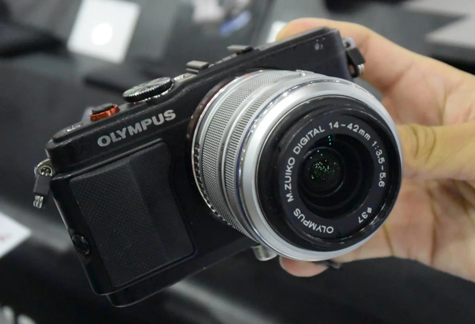 The PEN E-PL6 twin lens kit (14-42mm + 40-150mm) is another worthy consideration at $928 after trade-in, as this gets you a camera with 16MP Live MOS sensor and TruePic VI image processing engine.