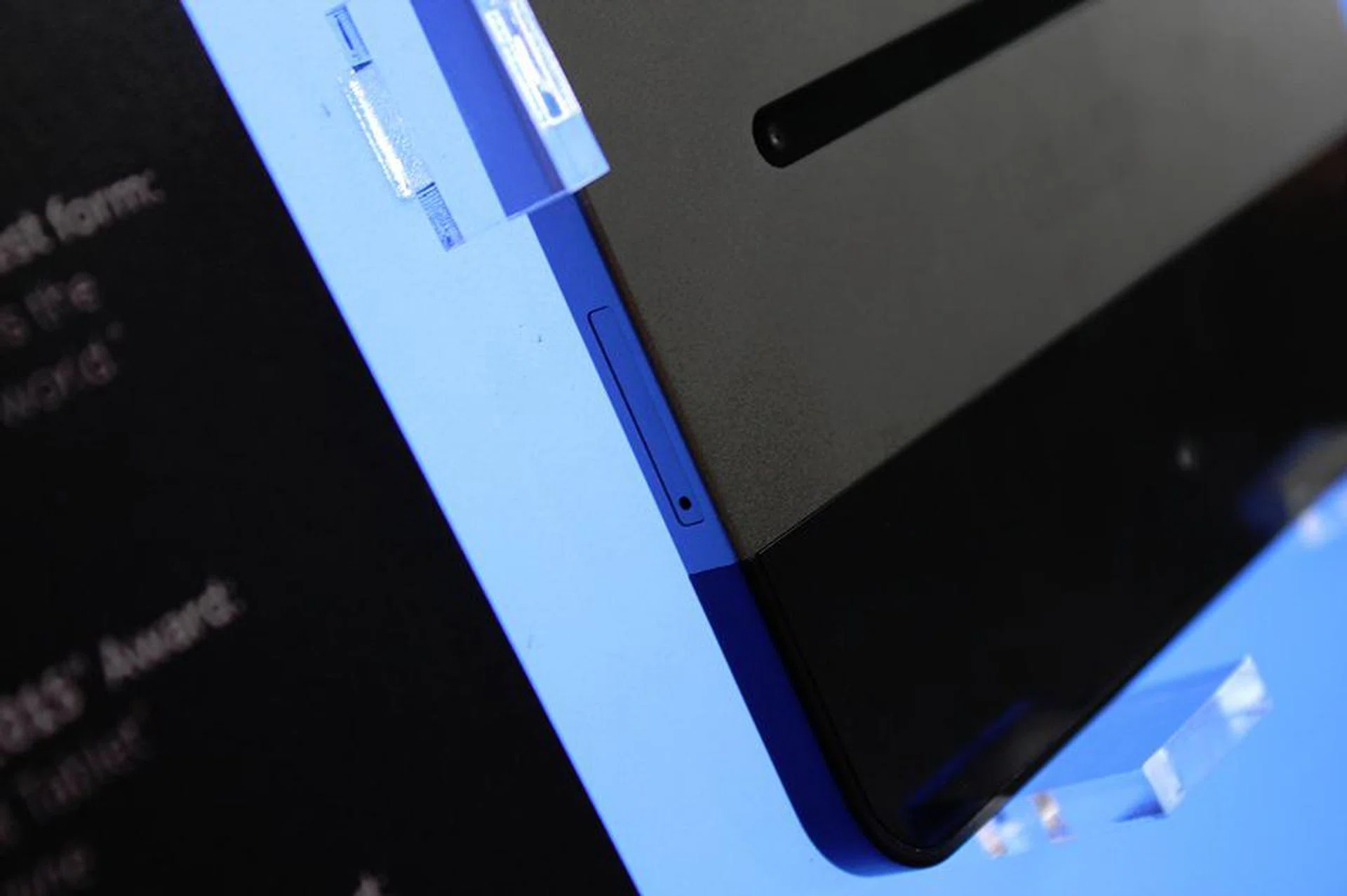 The unused SIM card slot's near the bottom of the machine. It also doubles as the microSD card slot. The local versions don't have LTE support and Dell currently has no plans on bringing the LTE version in.