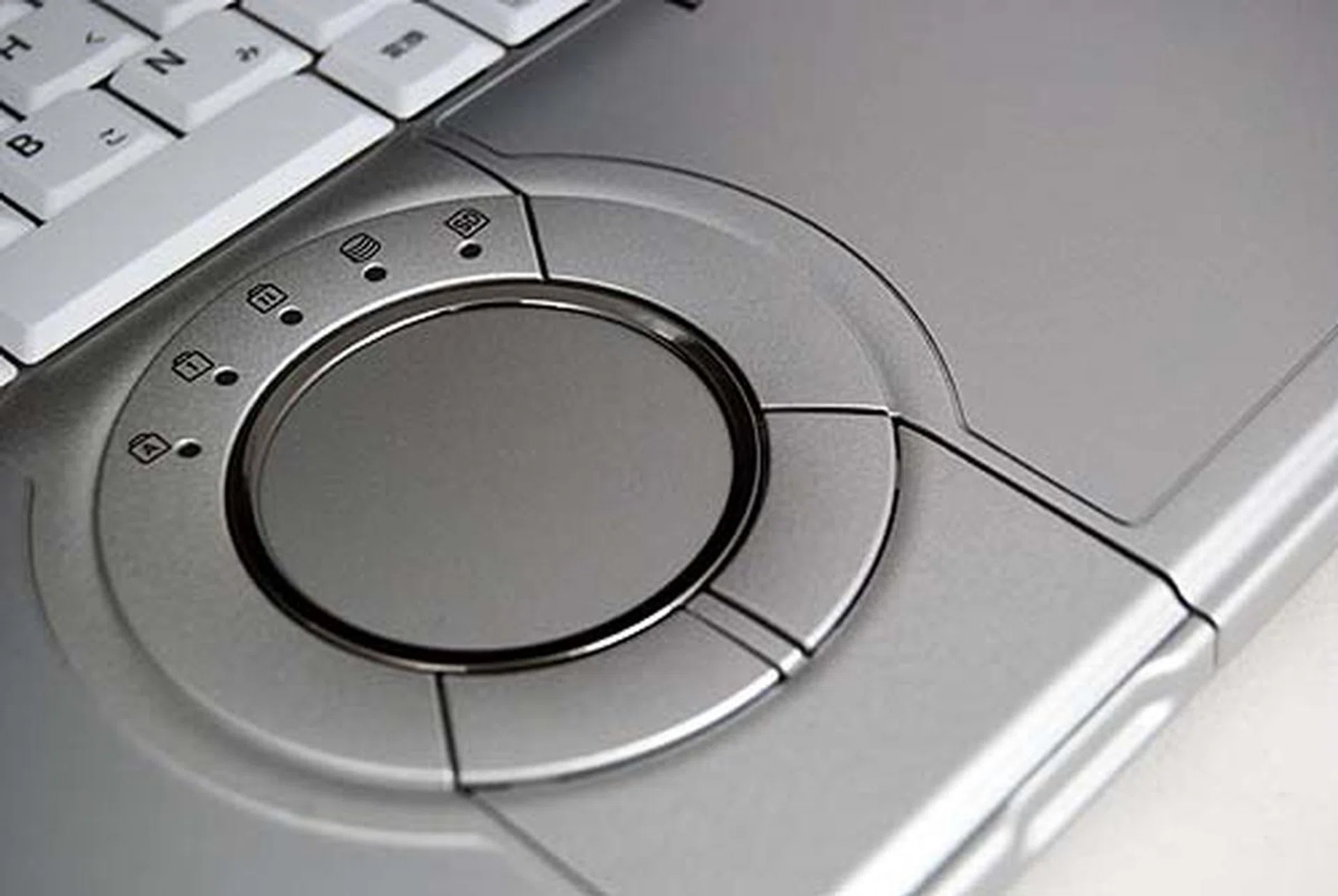 The familiar circular trackpad allows you to scroll by moving your finger around the edges. It feels natural and fun.