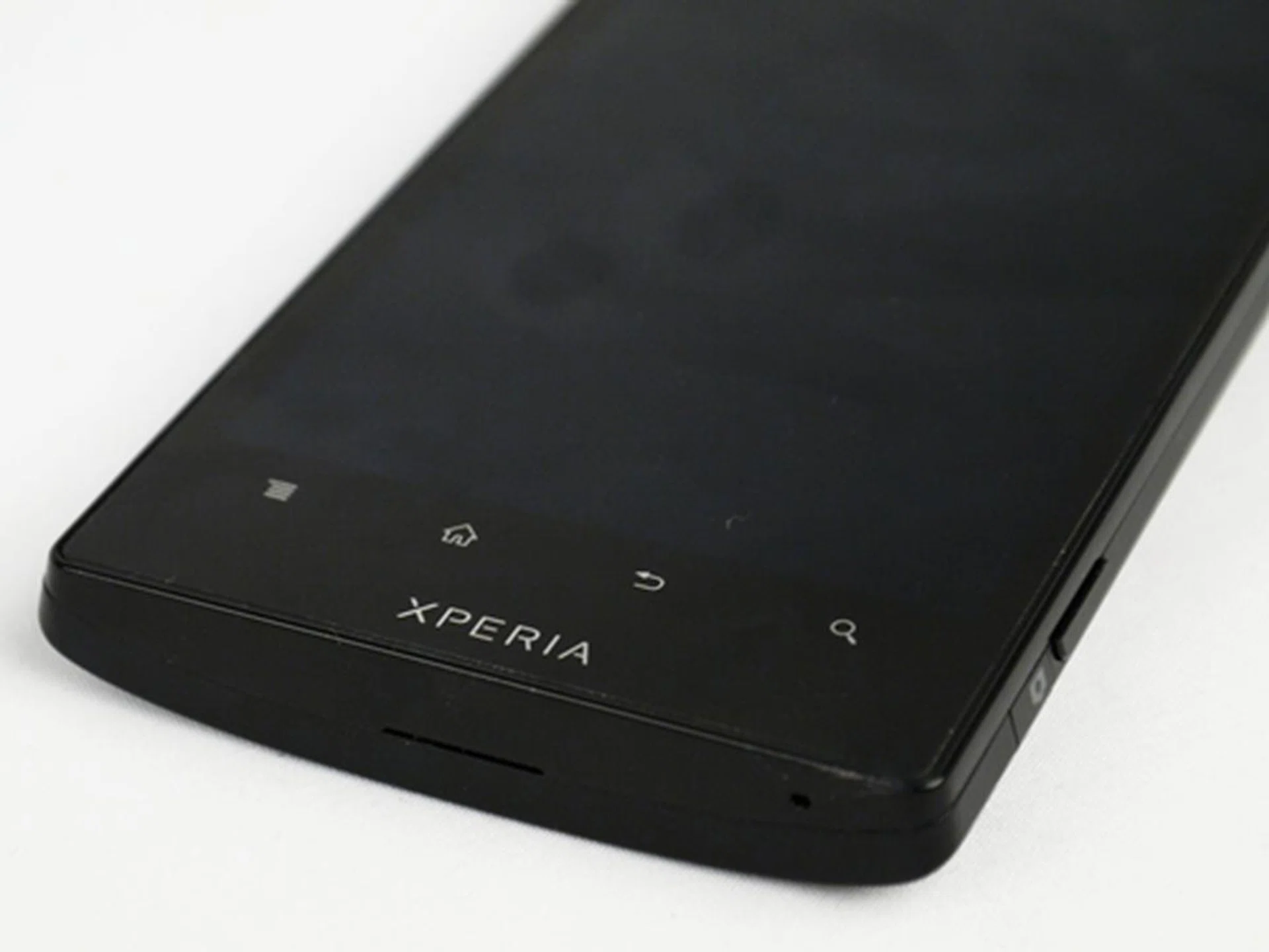 From left to right: Menu, Home, Back and Search.