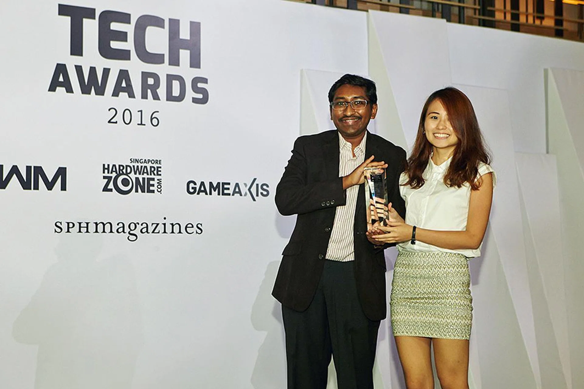 Qoo10 is our readers' favorite local electronics shopping portal. An elated Ms. Jolene Ng is present to accept the award on behalf of the company.