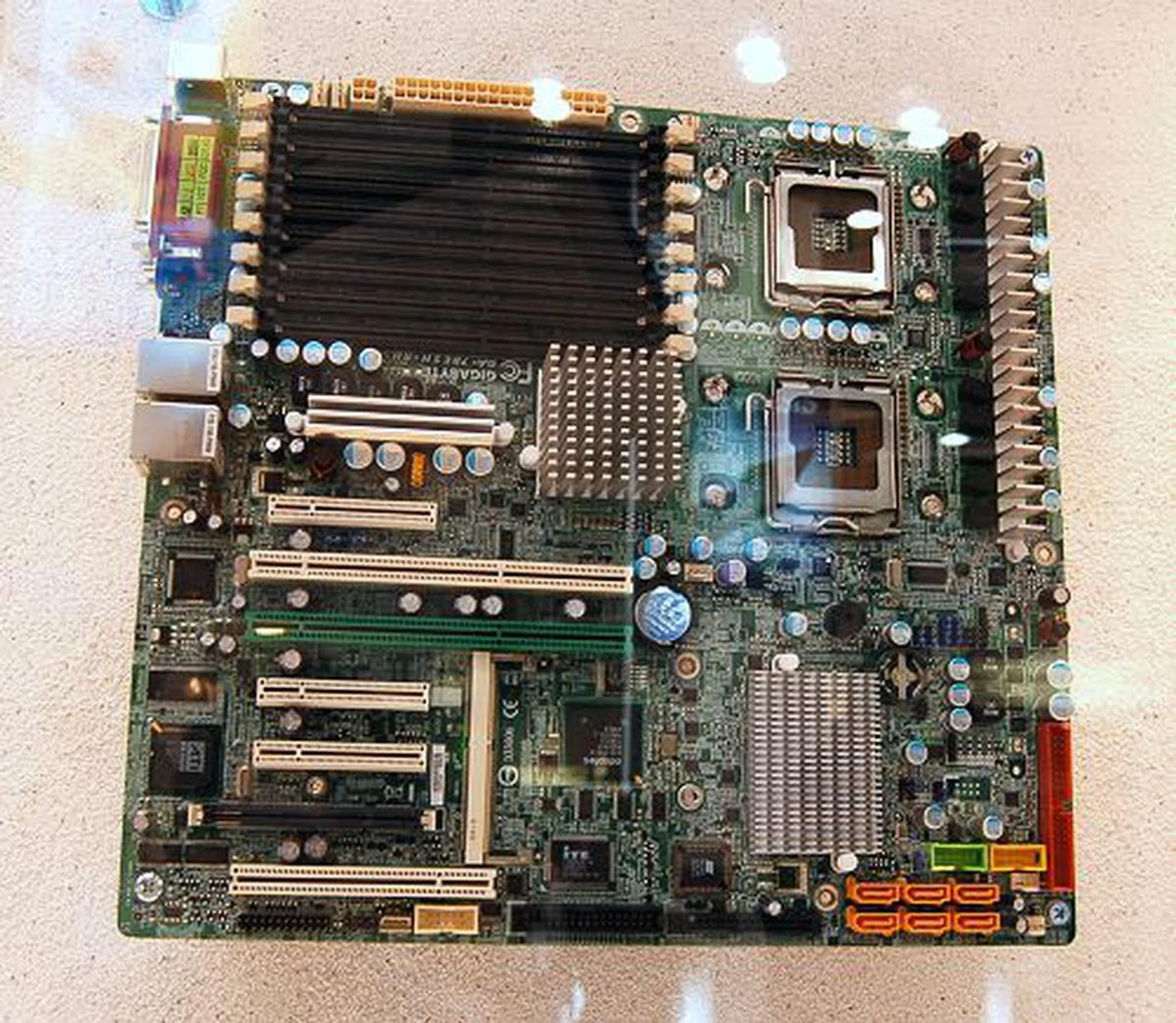  This dual socket performance motherboard (GA-7BESH-RH) based on the Intel 5000P chipset supports two multi-core Xeon processors of 1333MHz or 1066MHz FSB. Supports up to 32GB of DDR2 ECC FBDIMM in 8 DIMM slots, Adaptec AIC7901 SCSI RAID, two Gigabit Ethernet port with Intel I/OAT and has an expansion slot configuration of three PCIe x8, two PCI-X and one PC slot.  