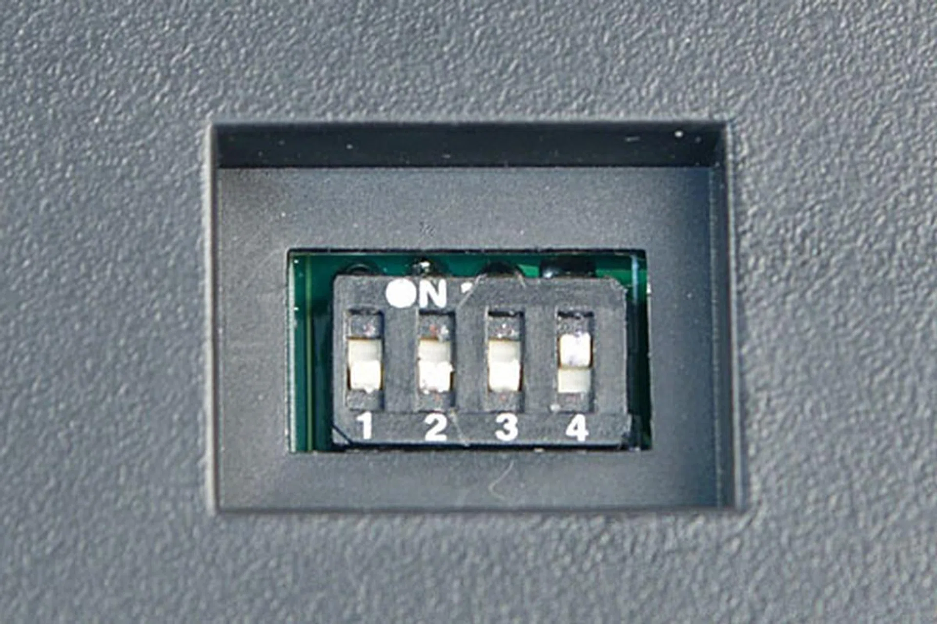 Four slide-style DIP switches under the keyboard turn on or off special functions. The first switch locks the two Windows keys, the second swaps the functions of the Caps Lock and left Control keys, and the third swaps the functions of the Windows and Alt keys. The fourth switch currently does nothing. Having the ability to lock the Windows keys during a game is quite a boon in comparison to some other  gaming-grade keyboards that don't include the Windows keys altogether.