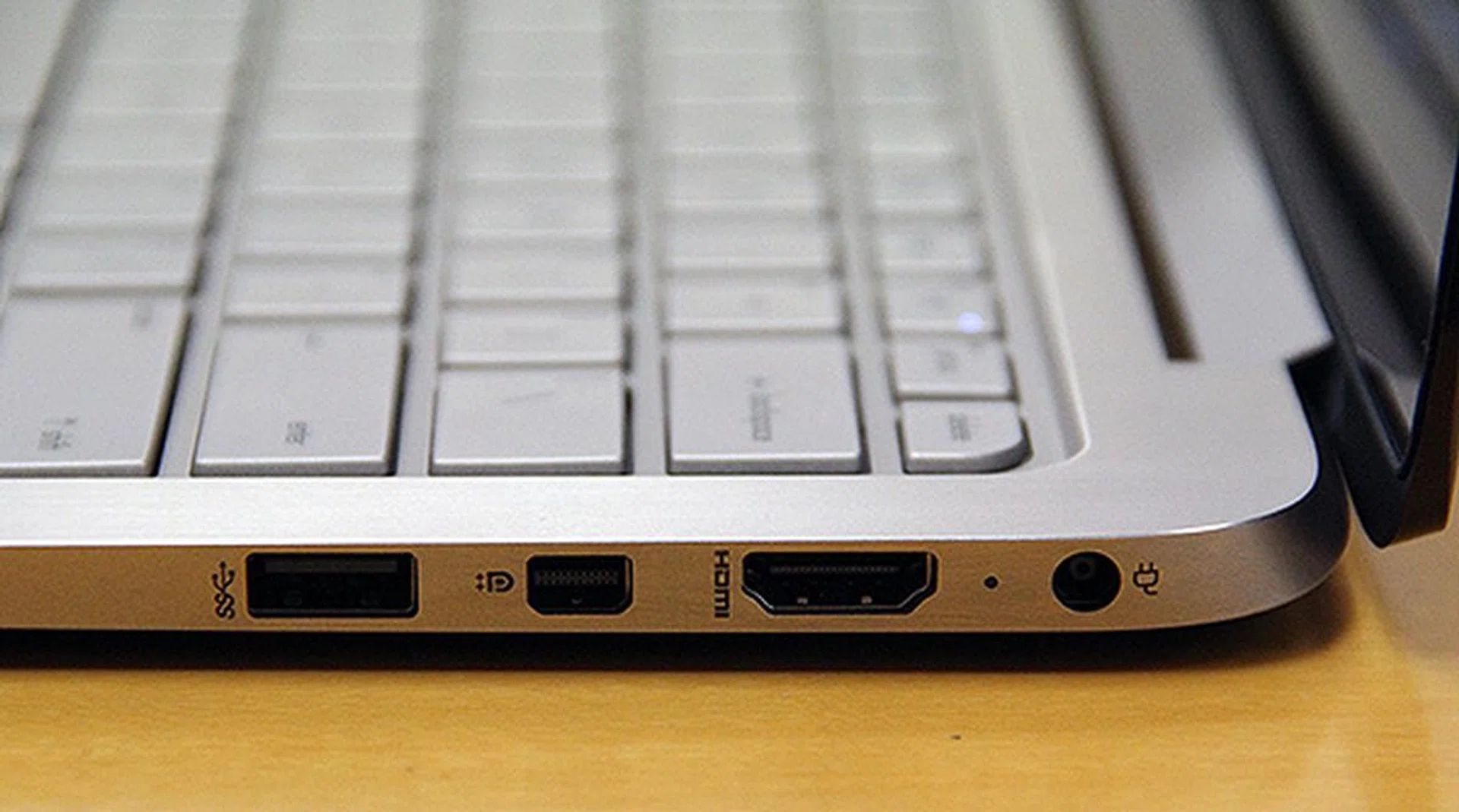 The notebook sports a HDMI port and a Mini-DisplayPort. They can be used together to drive two external displays simultaneously.