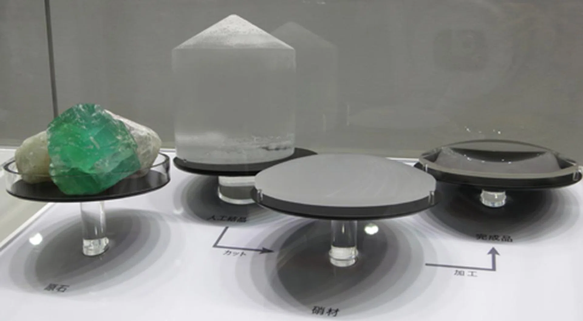 Meanwhile, for all you curious cats, this is fluorite (shown in various progressive states of its development), the artificial crystal that Canon uses in its Ultra-low Dispersion (UD) glass lens elements. This material is used in the focusing group of zoom lenses to eliminate secondary chromatic spectrum aberrations.