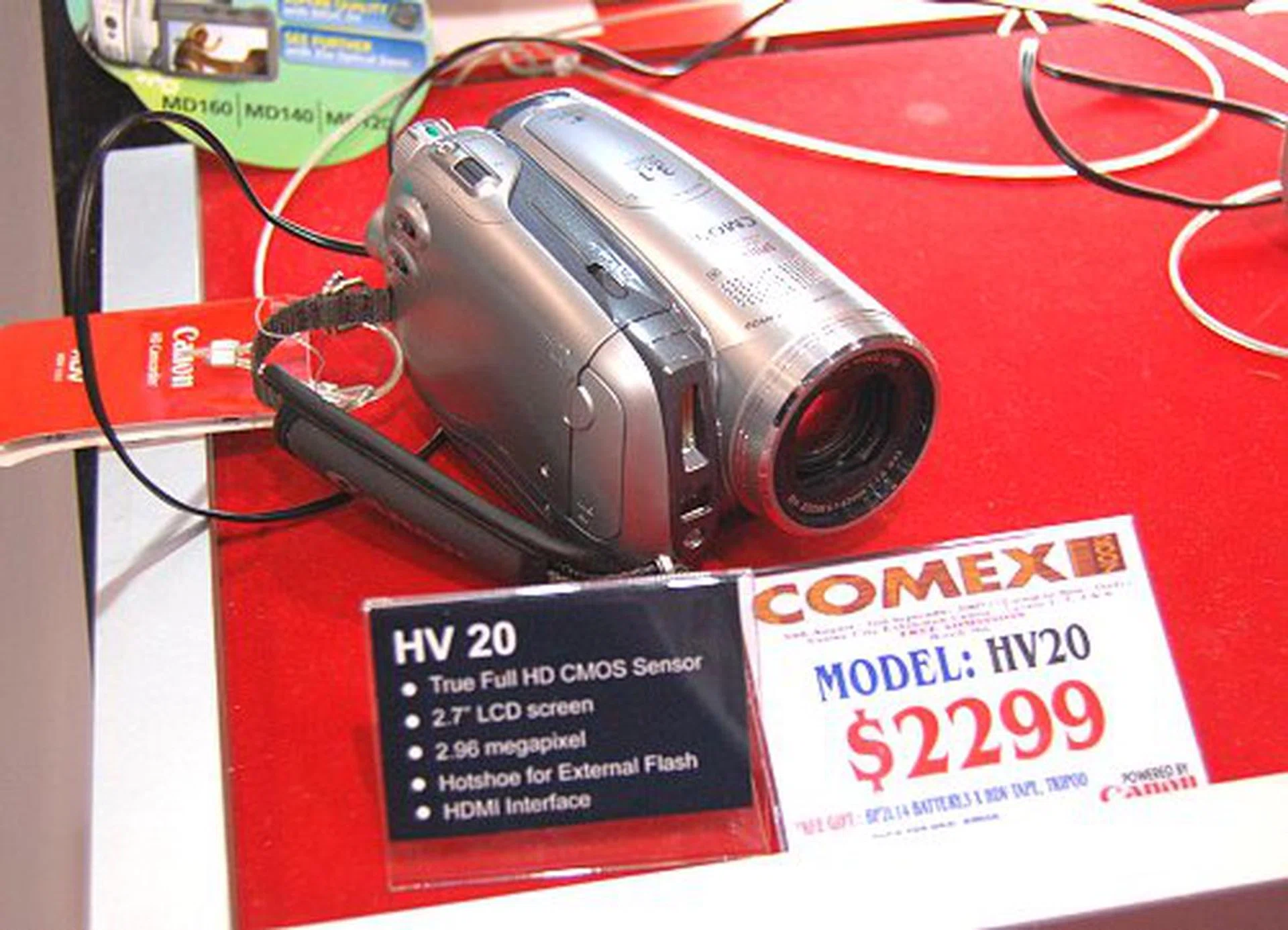  Need high definition in your life? Canon is offering their HV20 HD camcorder for S$2299 at Comex. The HV20 has a 2.96MP HD CMOS sensor for capturing 1080i HD videos, 10x optical zoom, 200x digital zoom, optical image stabilizer and super wide range. Free gifts include two batteries, three HDV tapes, a tripod and a 2.5-inch Maxtor 80GB external HDD.  