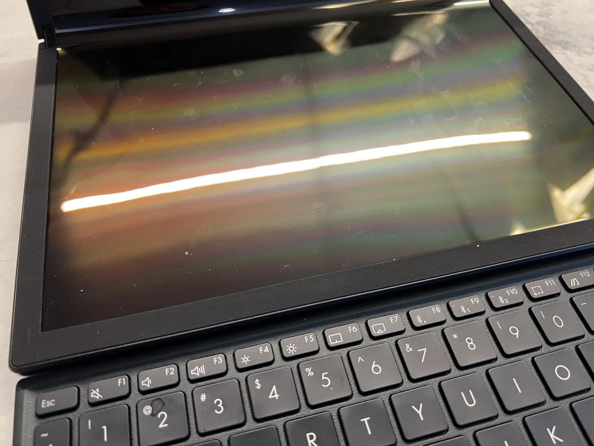 The only downside, a very large glossy touchscreen equals to a lot of fingerprint marks. Also, when using in the Extended Mode, depending on your overhead lighting, you will see reflections or banding on the bottom half of the display.