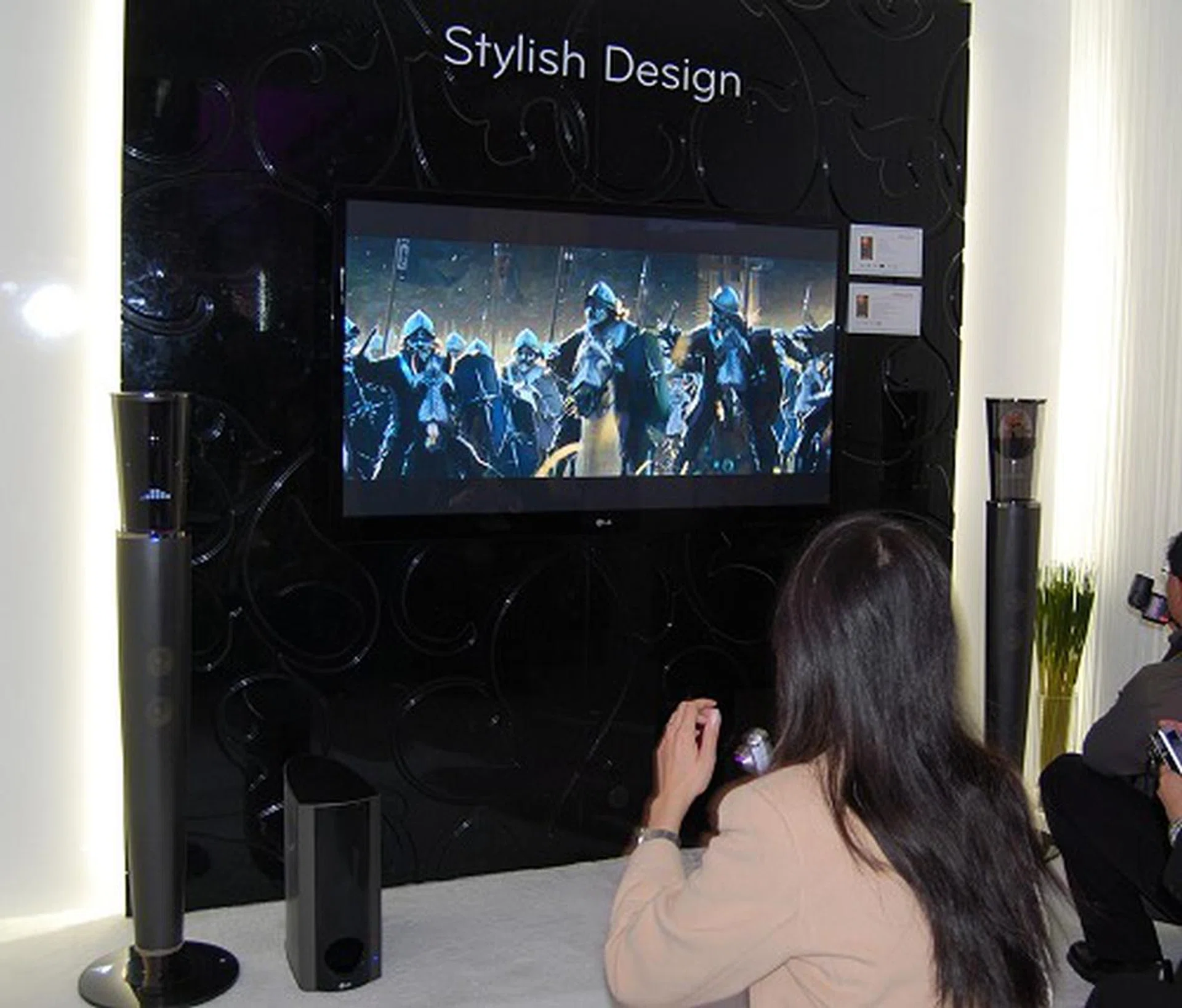 LG is moving up the price ladder to offer premium home theater speaker system models such as this stylish HB994PK model. It's a 4.1 channel speaker system , supports Blu-ray playback, fully wireless speaker system for all units, including speakers and subwoofer and built-in WiFi for wireless networking.