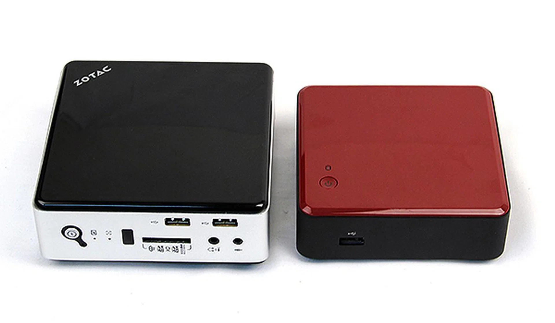 The Zotac ZBOX nano ID65 is noticeably larger, but still remains small and compact enough to be mounted behind displays and carried in bags.