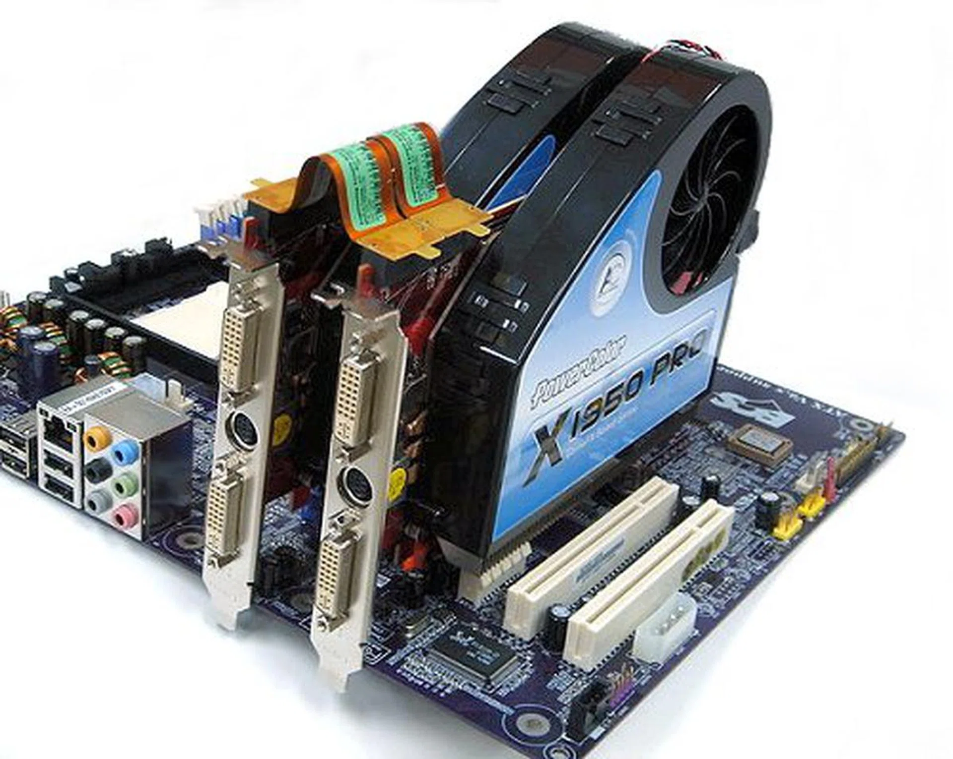 PowerColor provided this picture of their pair of Radeon X1950 PRO cards running CrossFire. Notice the flexible dual connectors used.