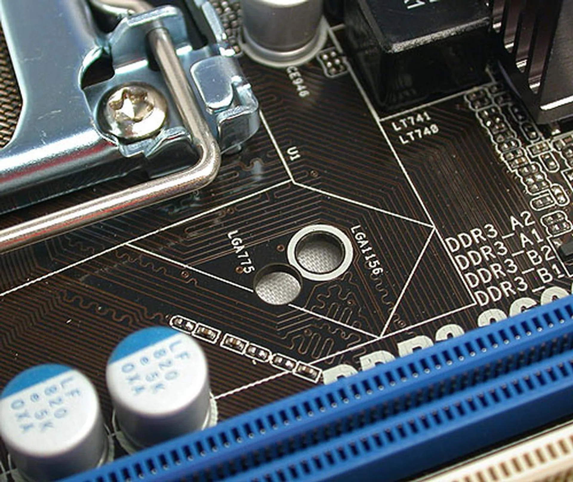 Here's something that we have seen often from ASRock - dual sets of mounting holes such that users can use either LGA1156 or LGA775 compatible CPU coolers. 