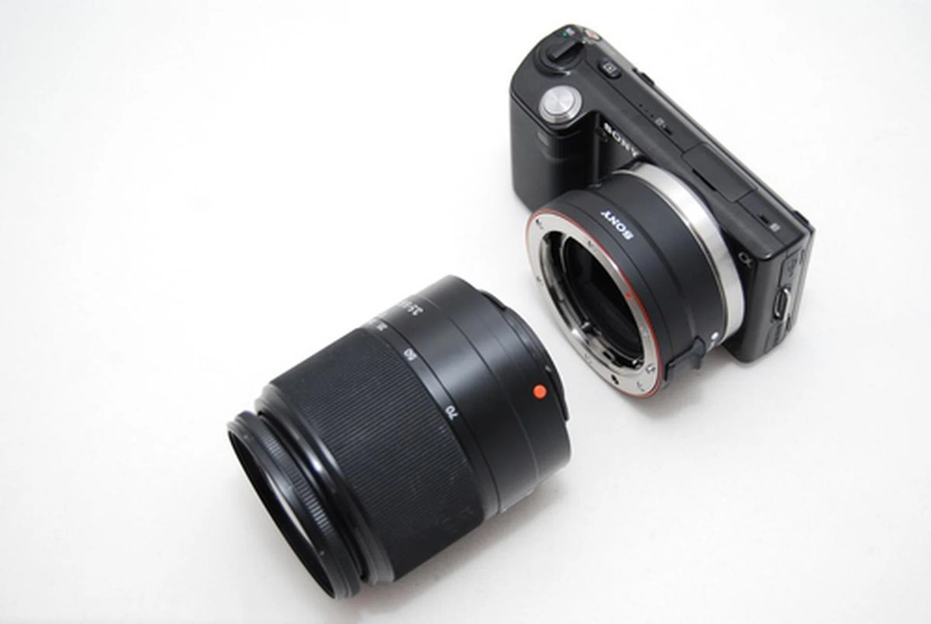 Alpha lenses can be used via an A-mount adapter, but you lose auto-focus, and add size and weight. Note that the adapter has to be purchased separately and is not part of the package.