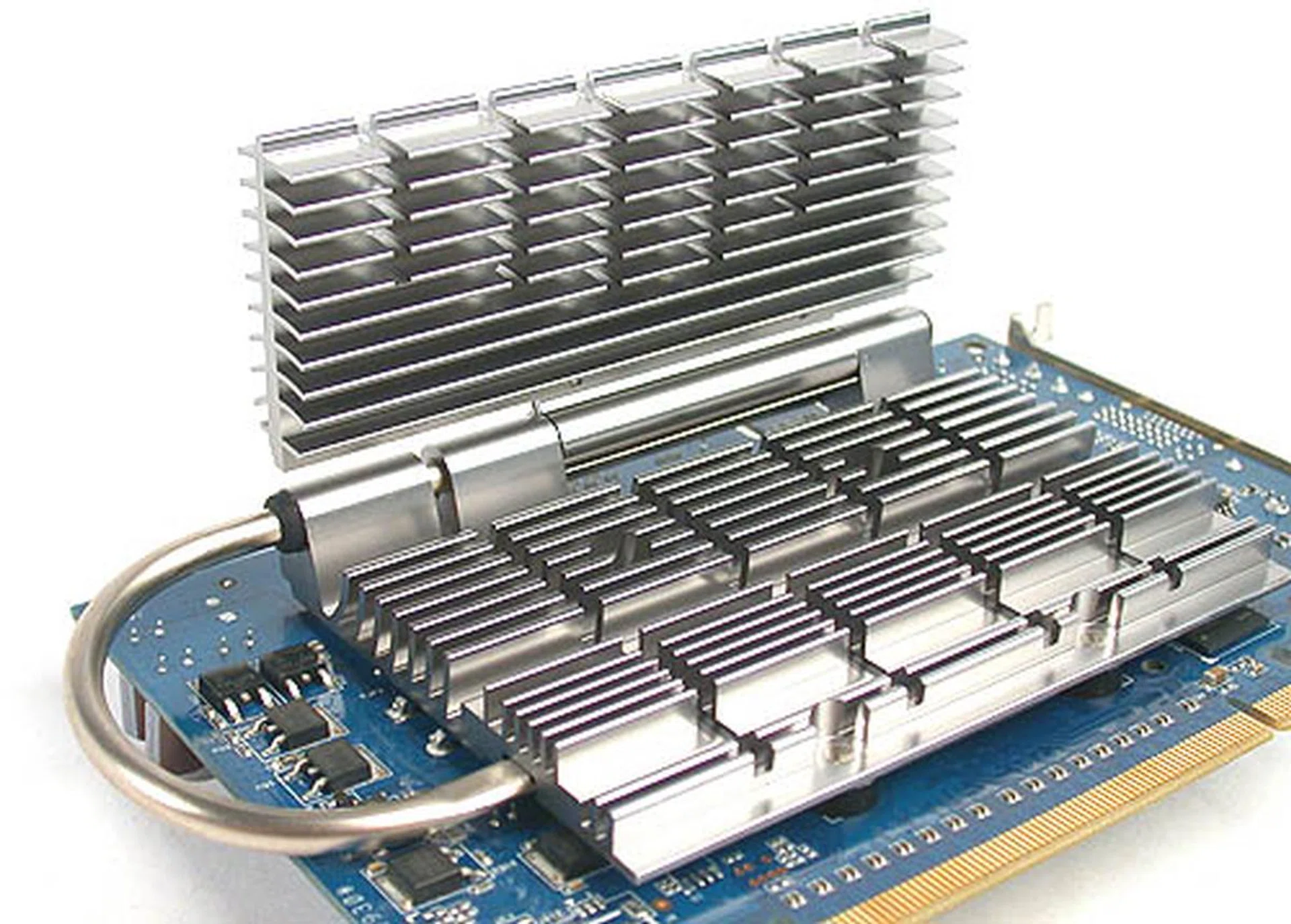 You can adjust the heatsink by flipping it open such that it can take advantage of the nearby CPU cooler to improve the rate of heat dissipation.