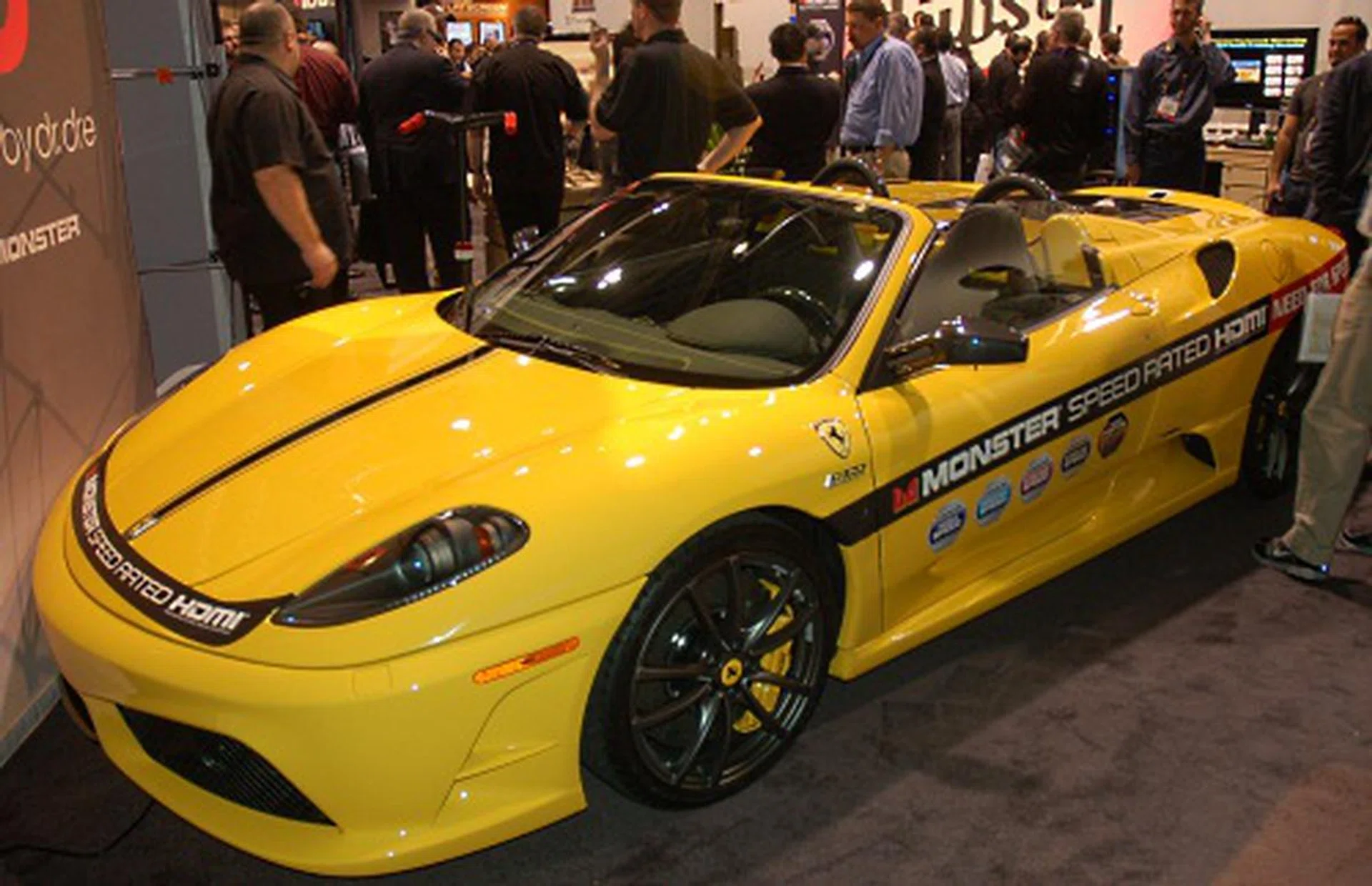 Why a Ferrari? Beats us. Perhaps it's to show how fast Monster HDMI cables are capable of. Or that the company makes obscene amounts of money from selling them?