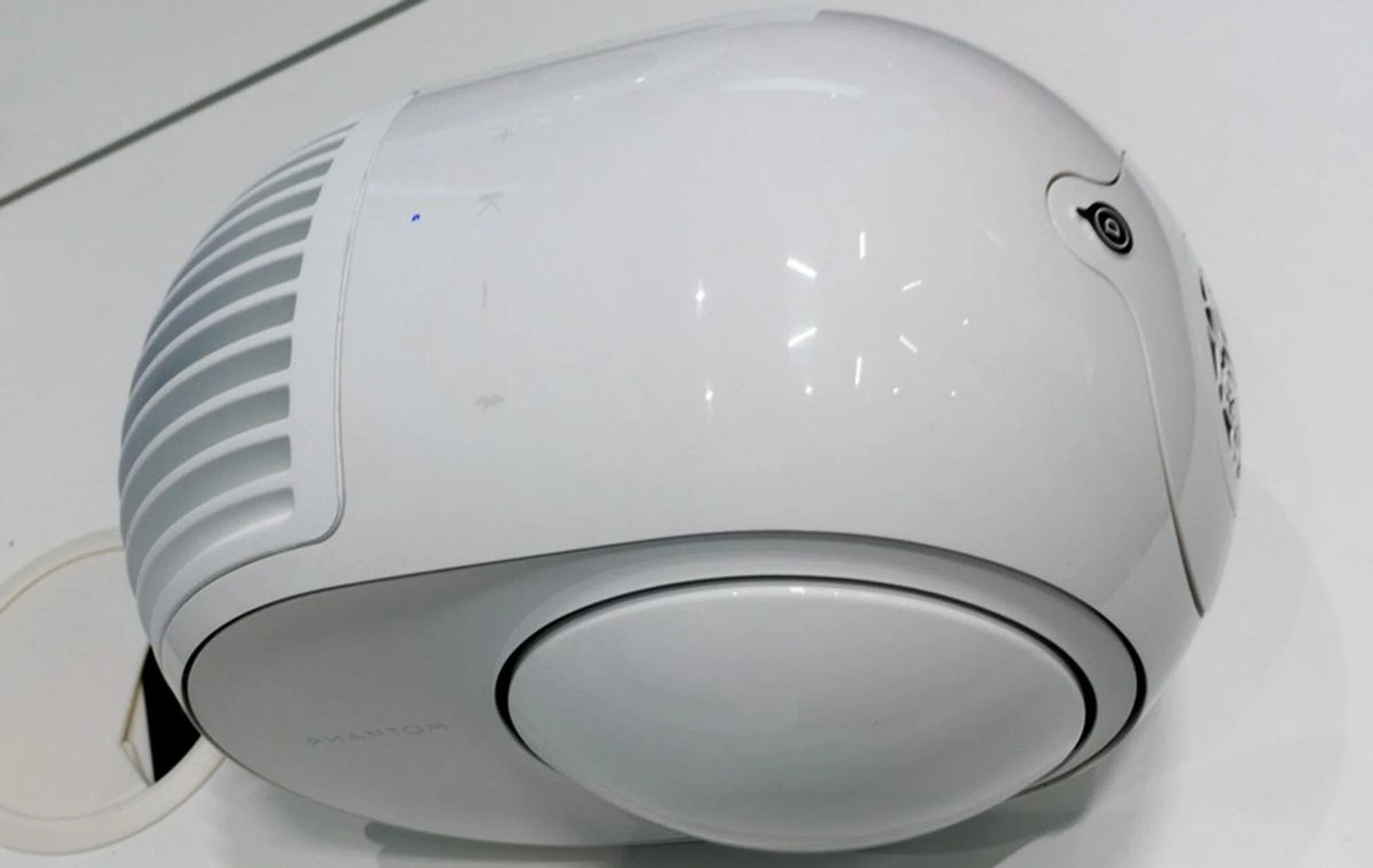 Touch controls can be found on top of the speaker.