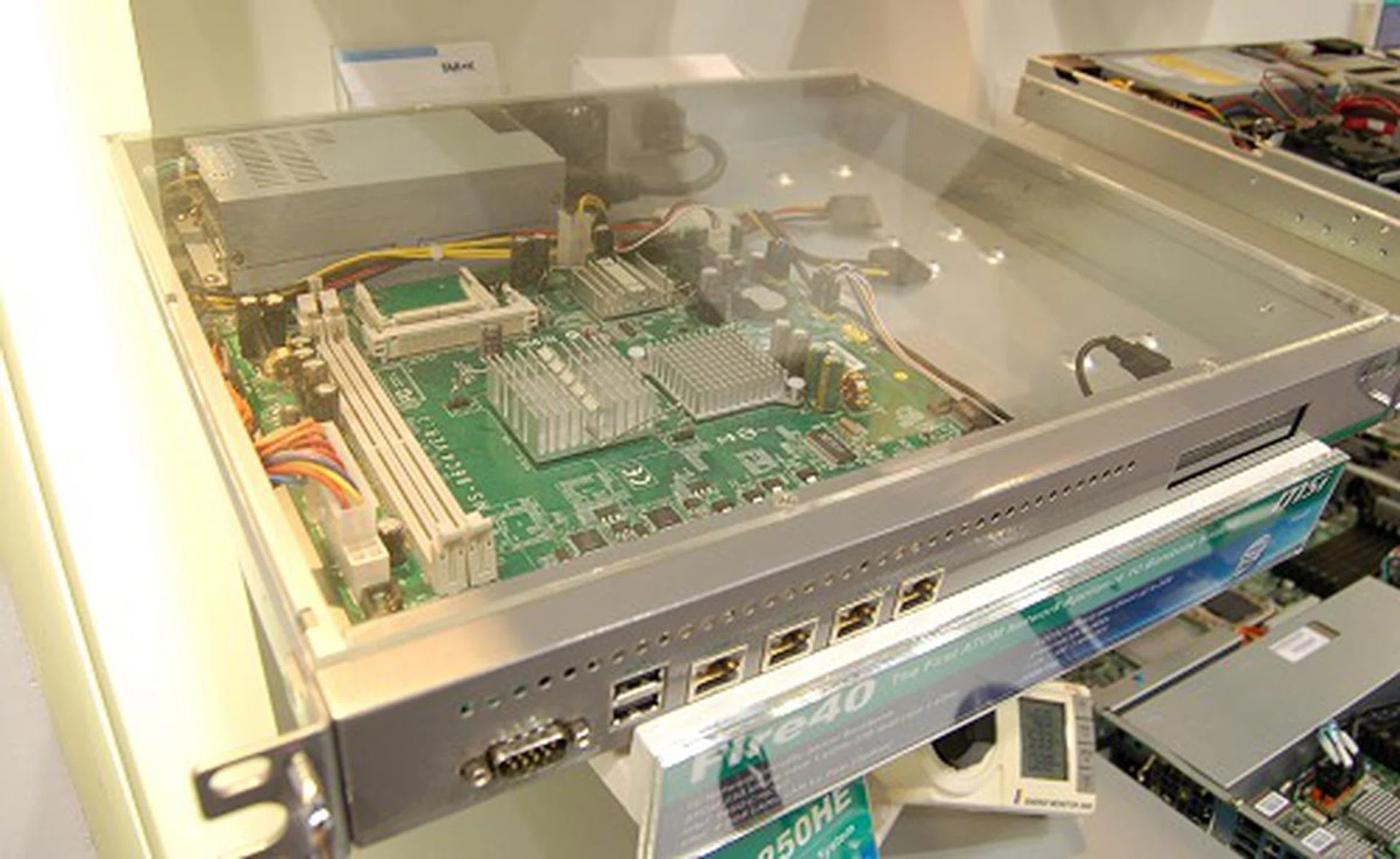  This is the MSI Fire40, the first first Atom-based network security appliance 1U barebones server. Specs include an Atom 230 or 330 processor, four Gigabit LAN ports, up to 2GB memory, two SATA drives and a 220W PSU.  