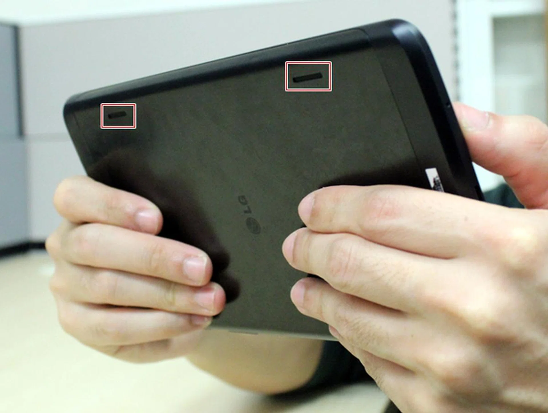 While the stereo speakers are not blocked by the hands, audio output is directed away from you on the LG G Tablet 8.3.