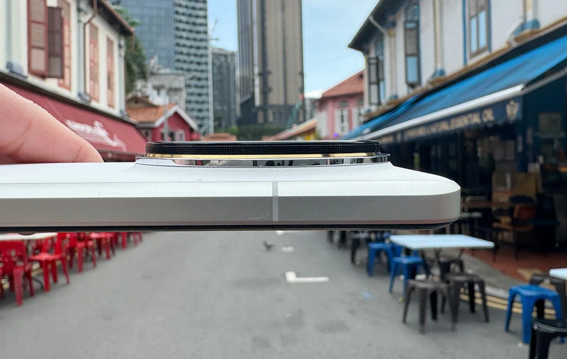 From the side, you can clearly see that its camera housing is nearly as thick as the phone's body.