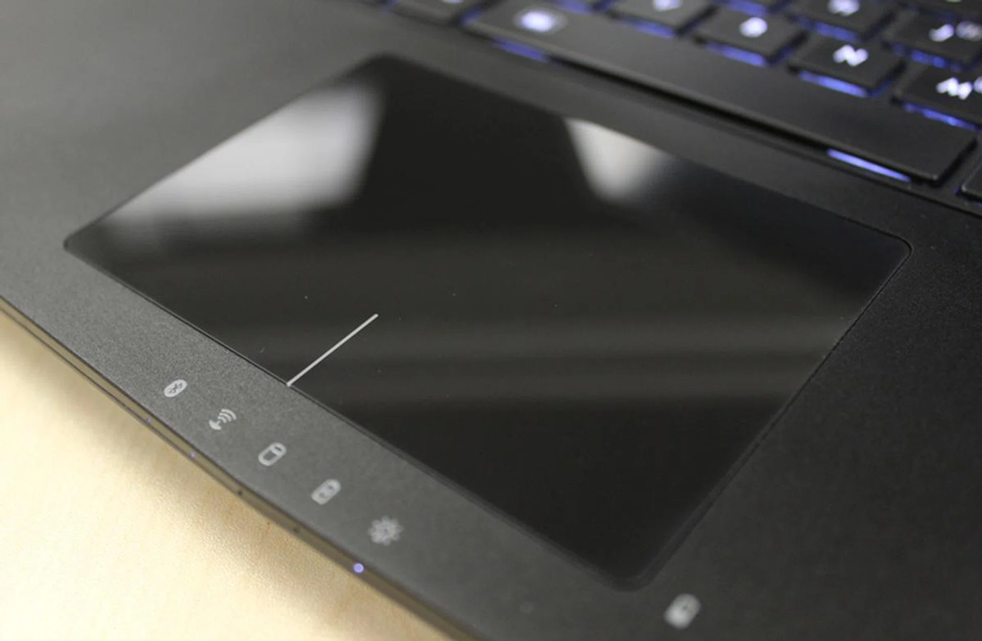 The glossy trackpad returns. Better get the microfiber cloth ready.