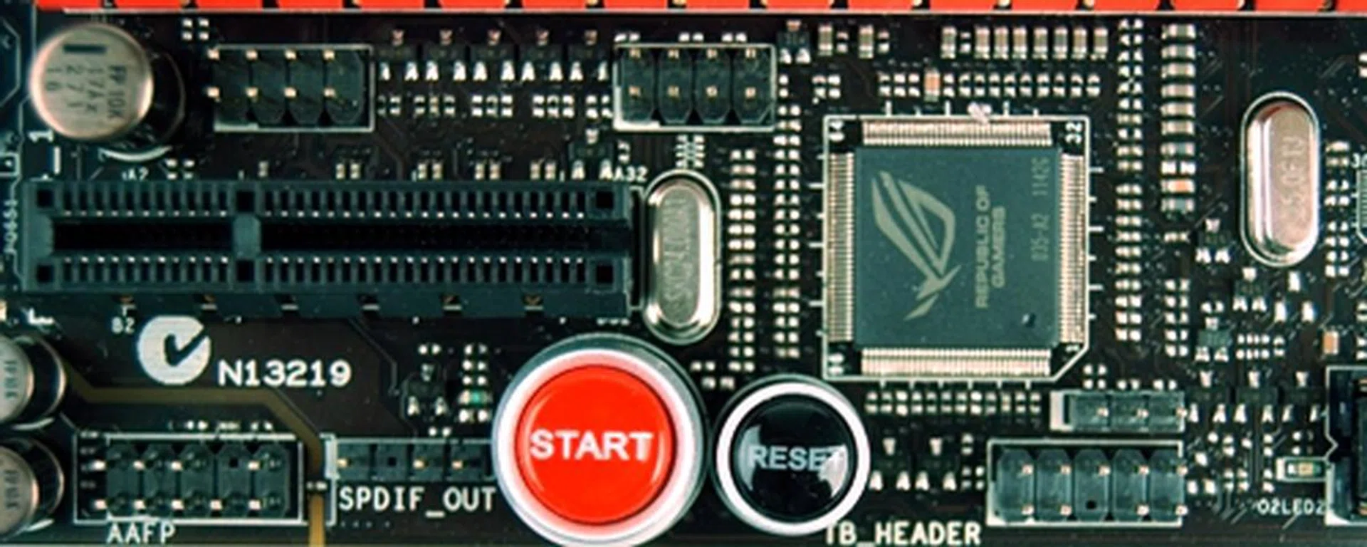The ROG Connect controller chip sits above onboard start and reset switches. 