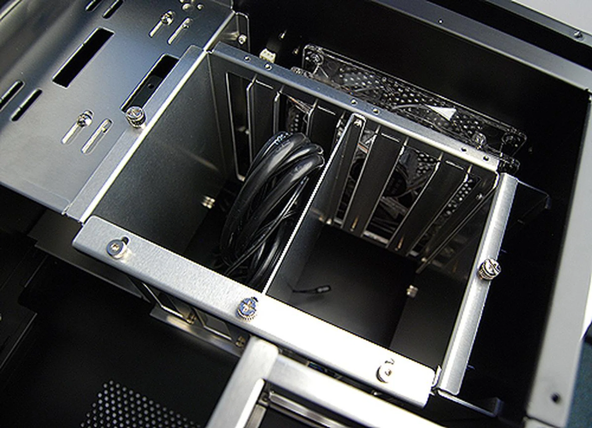 There's space for up to four 3.5-inch hard disks. However, if you were to be using a long graphics card, chances are the top two bays would be unusable, because the card would extend out from the motherboard tray. Note that under the drive cage is space for installing an SSD drive. 
