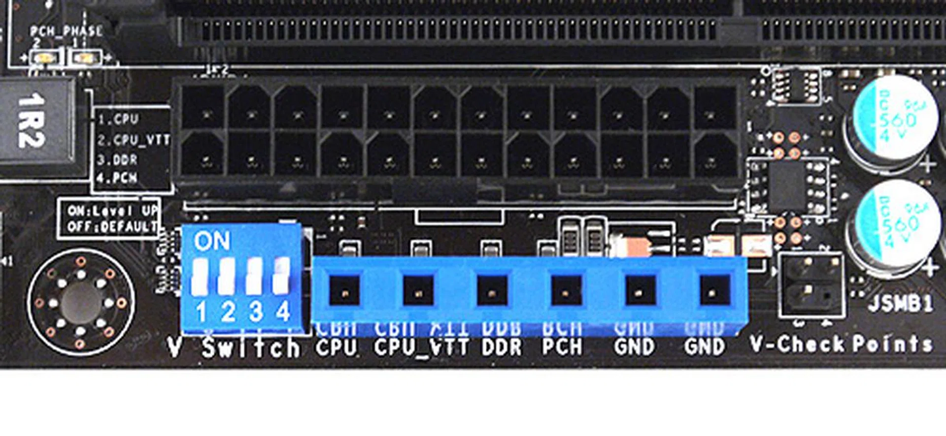 Slightly to the right of the SATA ports is the V Check Point, which allows more skilled users to accurately measure the CPU, memory and chipset voltages. The switch on the left allows for the convenient increase of overclocking voltages.