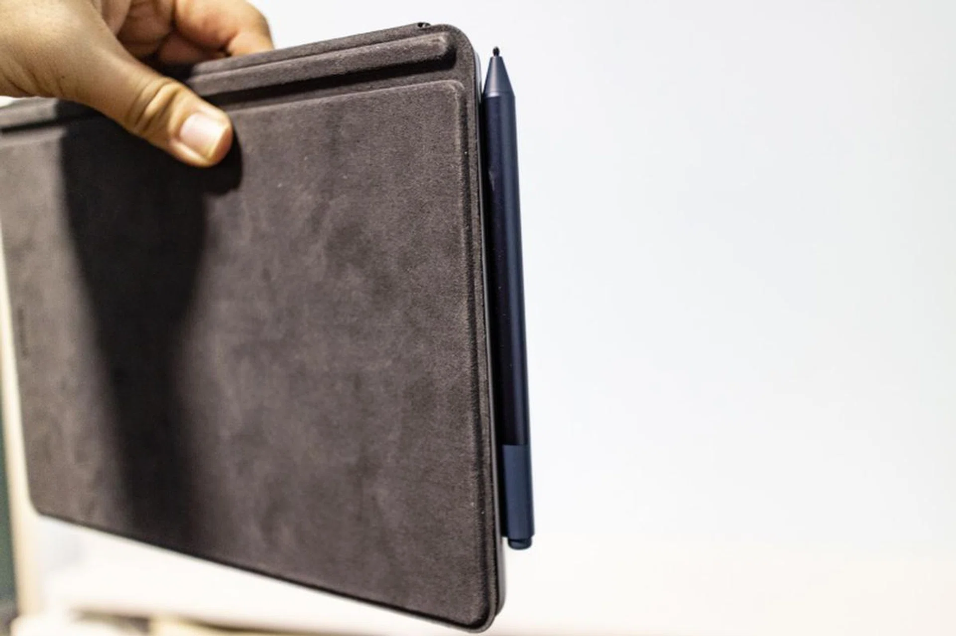 That's how you attach the optional Surface Pen to the detachable Surface Go notebook.