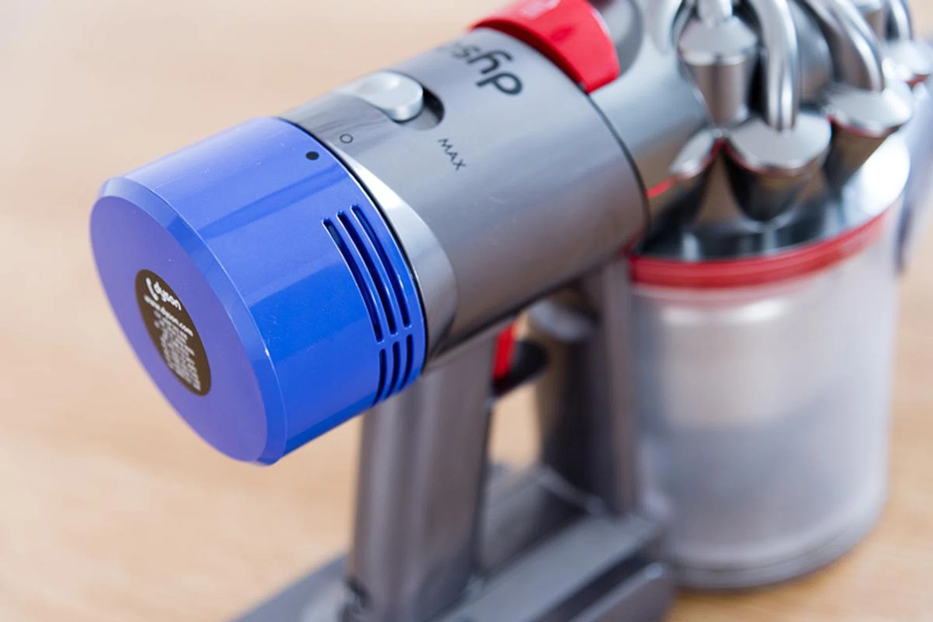 The blue cap houses a HEPA filter, which can be detached and washed.
