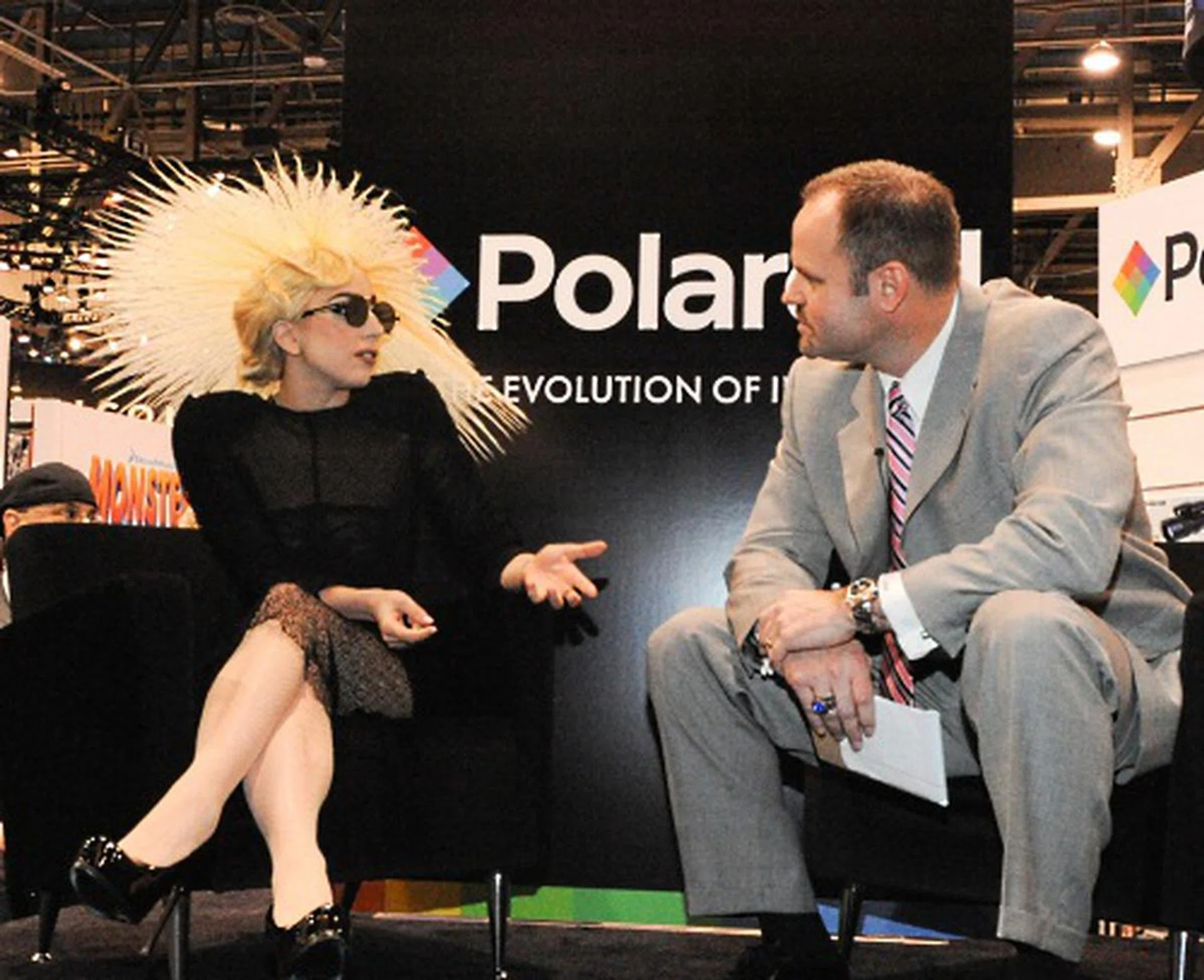 And the reason for the crowd - Lady Gaga was at the booth to be unveiled as Polaroid's new creative director, essentially a brand ambassador and spokesperson for the company.