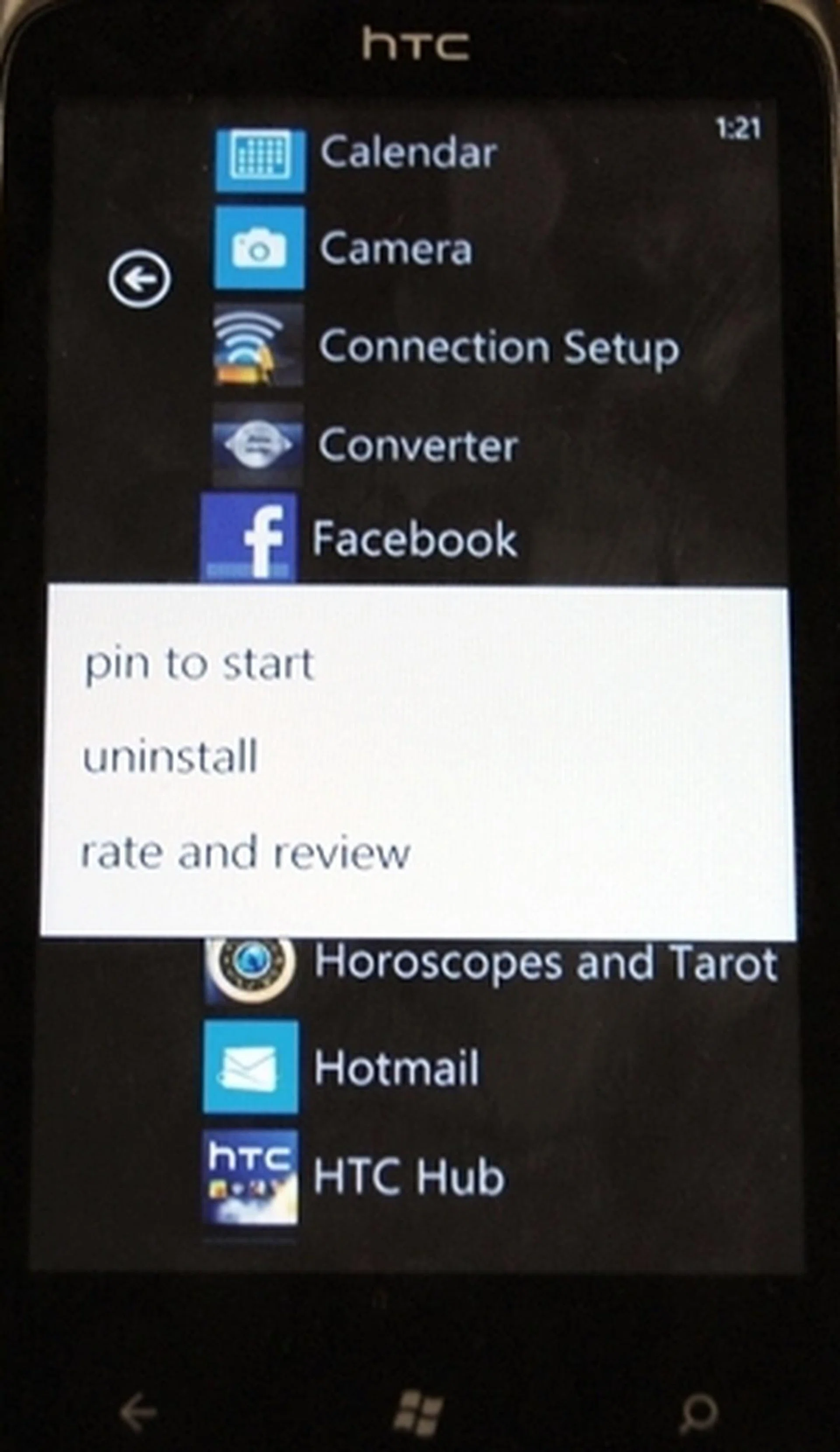 Long-pressing an app on the apps page list will allow you to select between pinning it to the home page, uninstalling or reviewing it.