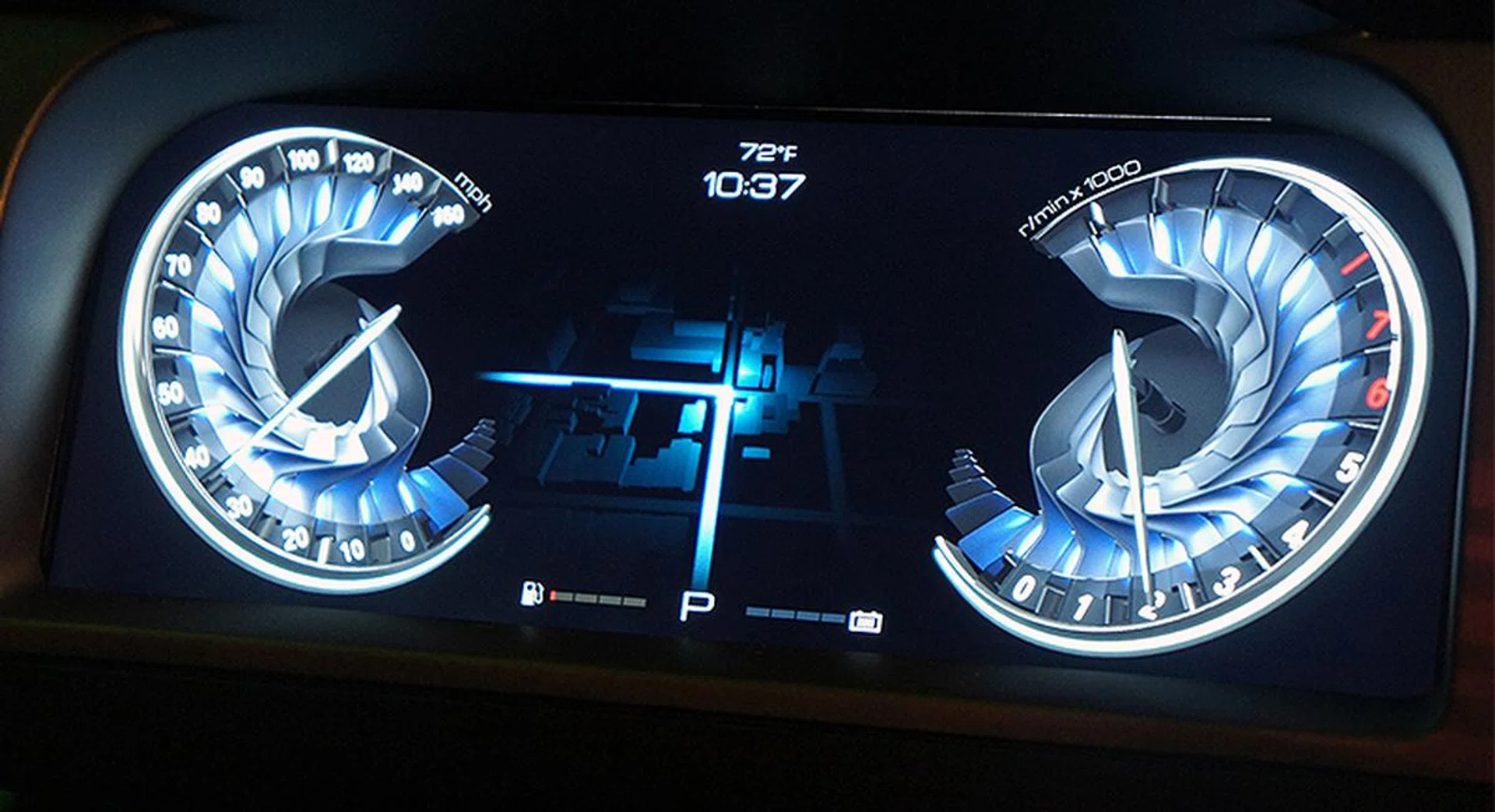 A close look at a dashboard powered by the Drive CX. Those are 3D meters with ambient lighting effects that reacts with the counter as it sweeps across the dial.