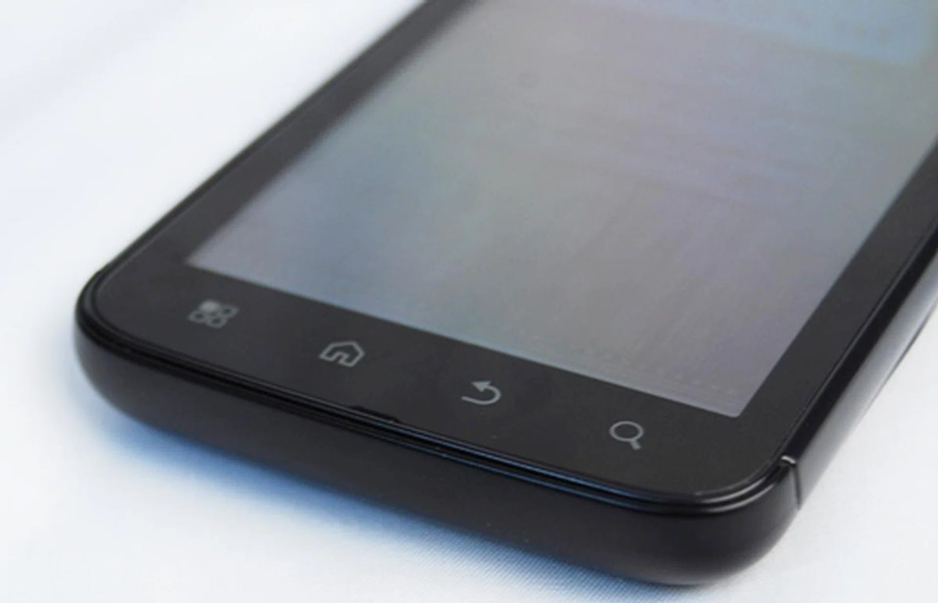 The Atrix's touch buttons will glow once the screen is activated.