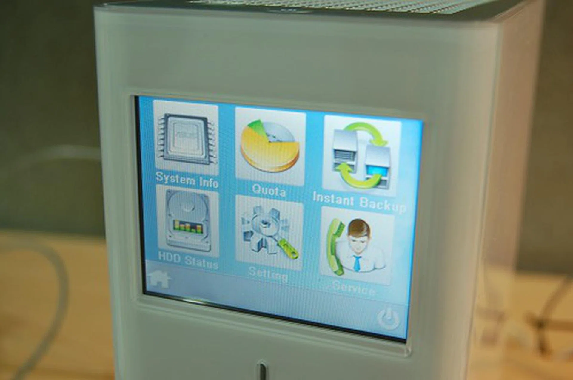  Note that it even comes built-in with a small 3.5-inch touch-screen display for managing the storage subsystem. The rear of the unit has a DVI output, four USB ports, four LAN ports, one WAN port and the usual audio outputs.  